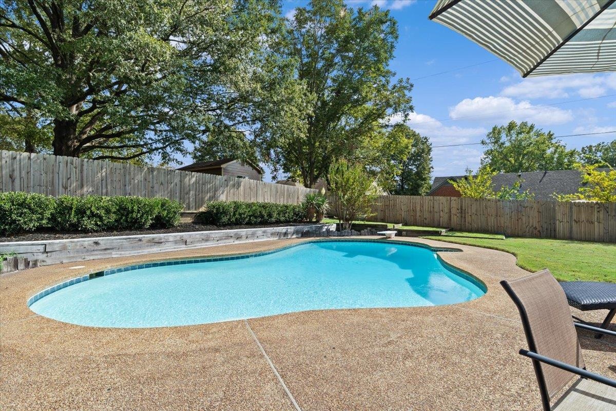 369 Taraview Road Collierville, TN 38017 - Photo 31 of 34 a view of swimming pool and deck in the backyard