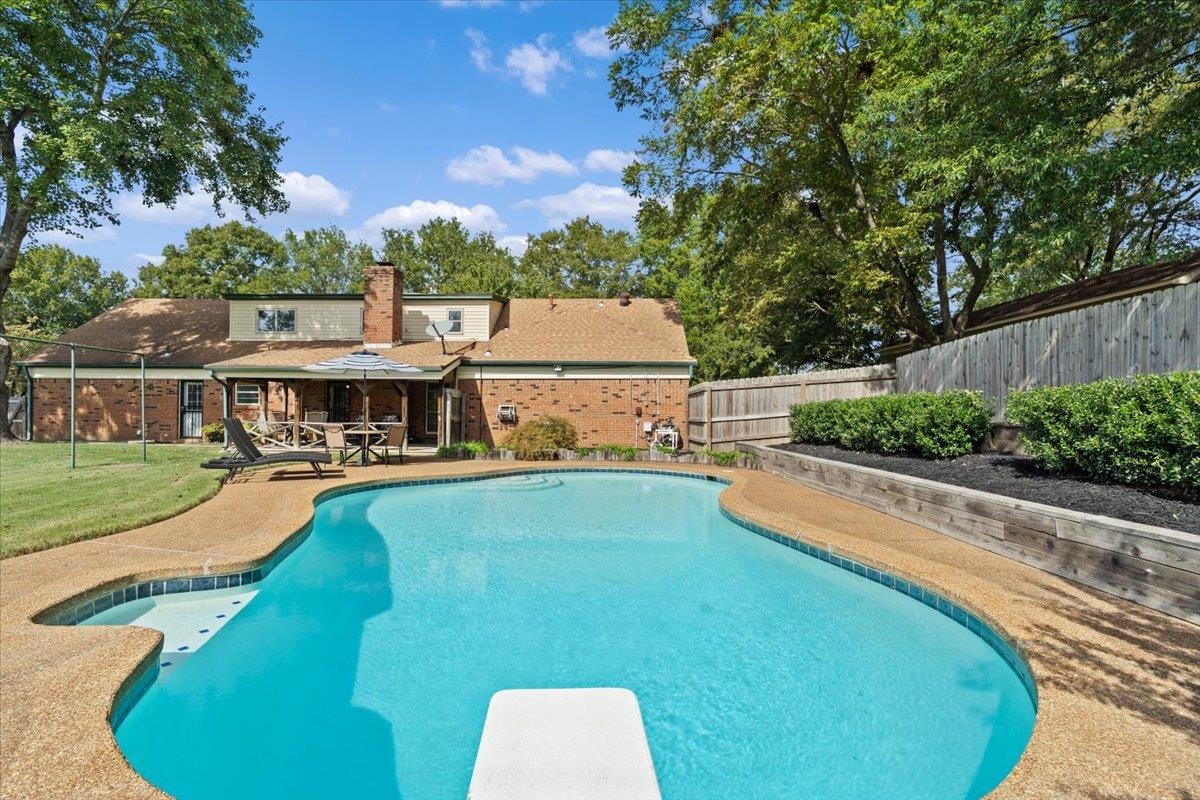 369 Taraview Road Collierville, TN 38017 - Photo 32 of 34 a view of a swimming pool with a patio