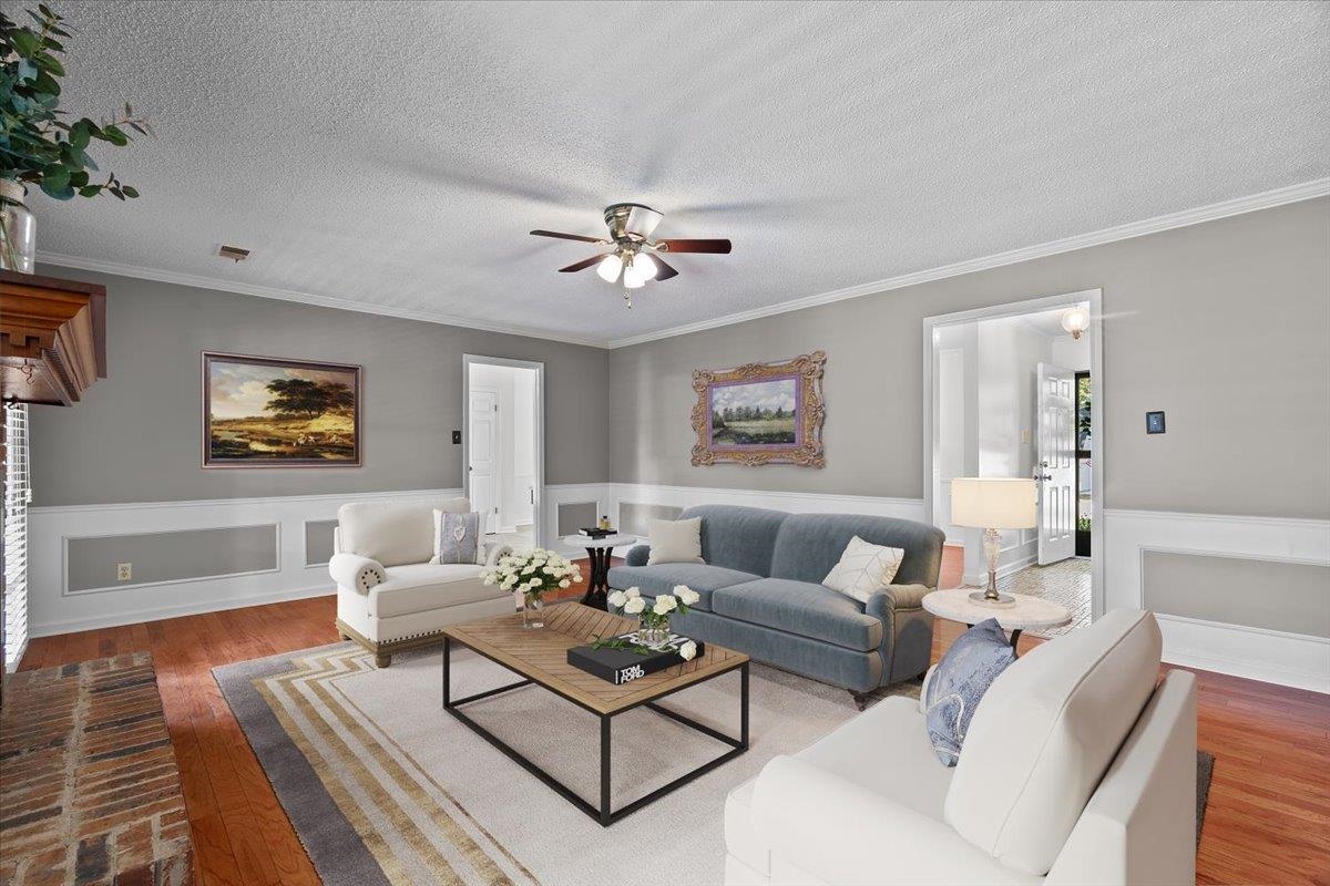 369 Taraview Road Collierville, TN 38017 - Photo 9 of 34 a living room with furniture and a wooden floor