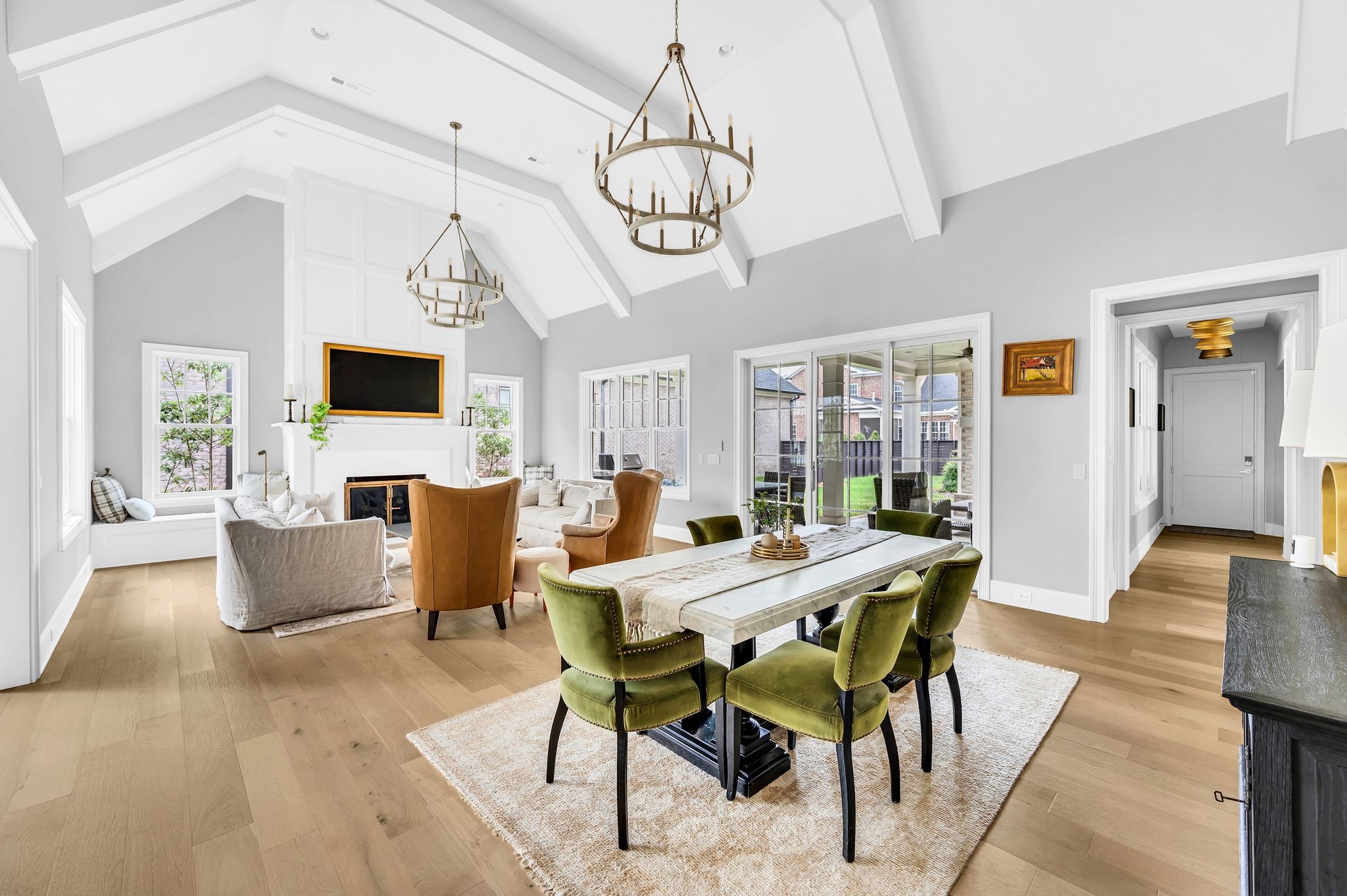 6081 Pasquo Road Nashville, TN 37221 - Photo 11 of 70 a view of a dining room with furniture wooden floor and chandelier