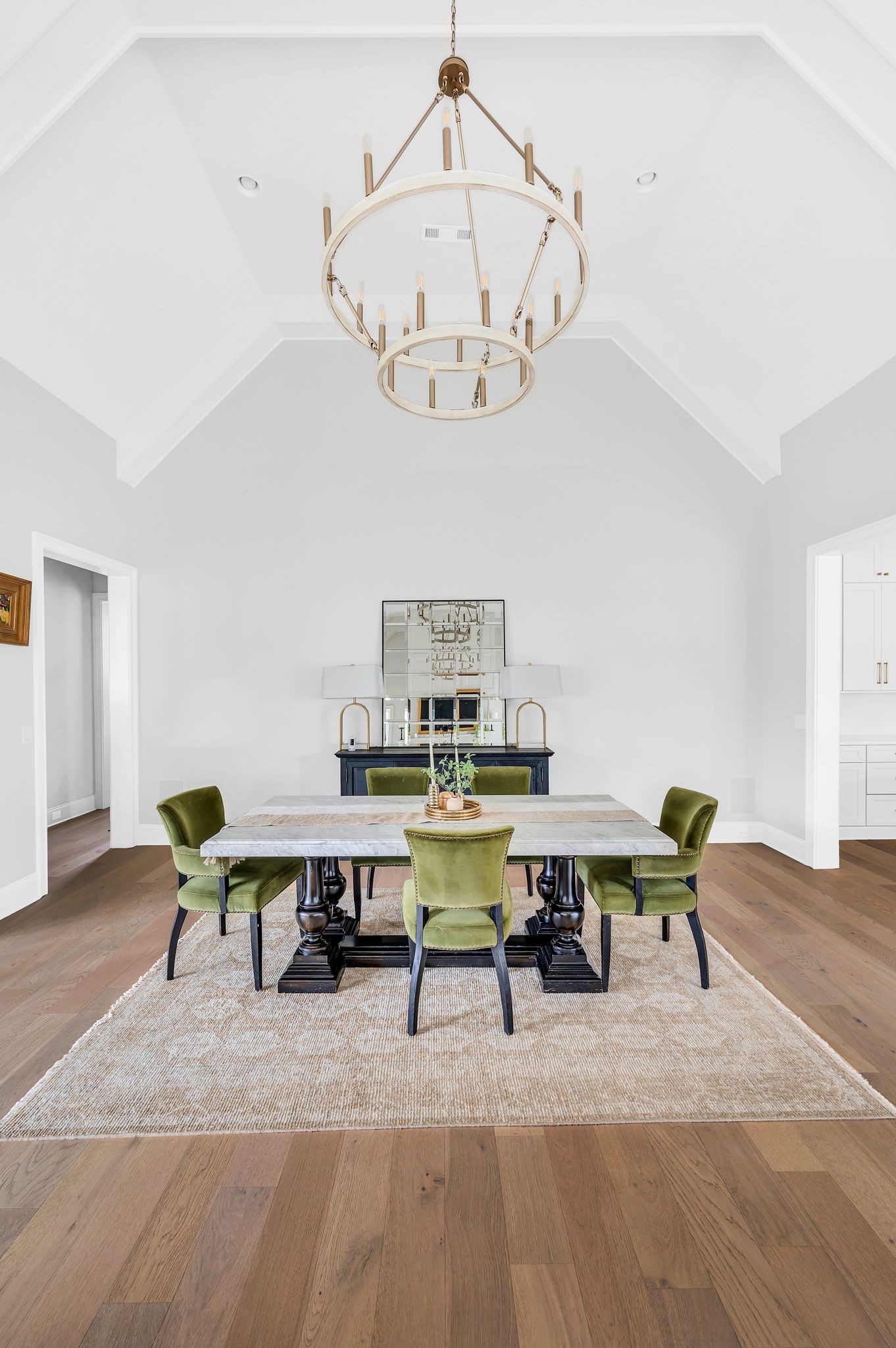 6081 Pasquo Road Nashville, TN 37221 - Photo 14 of 70 a view of a dining room with furniture chandelier and wooden floor