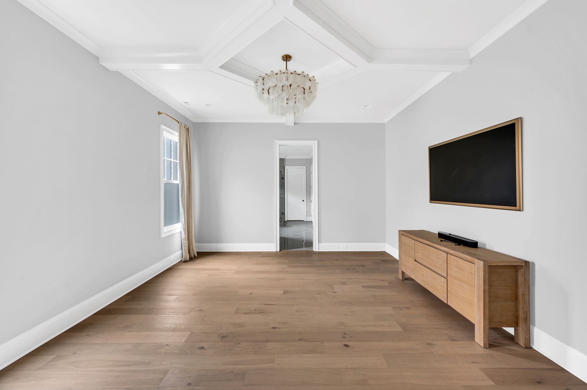6081 Pasquo Road Nashville, TN 37221 - Photo 36 of 70 a view of an empty room with a flat screen tv and a window