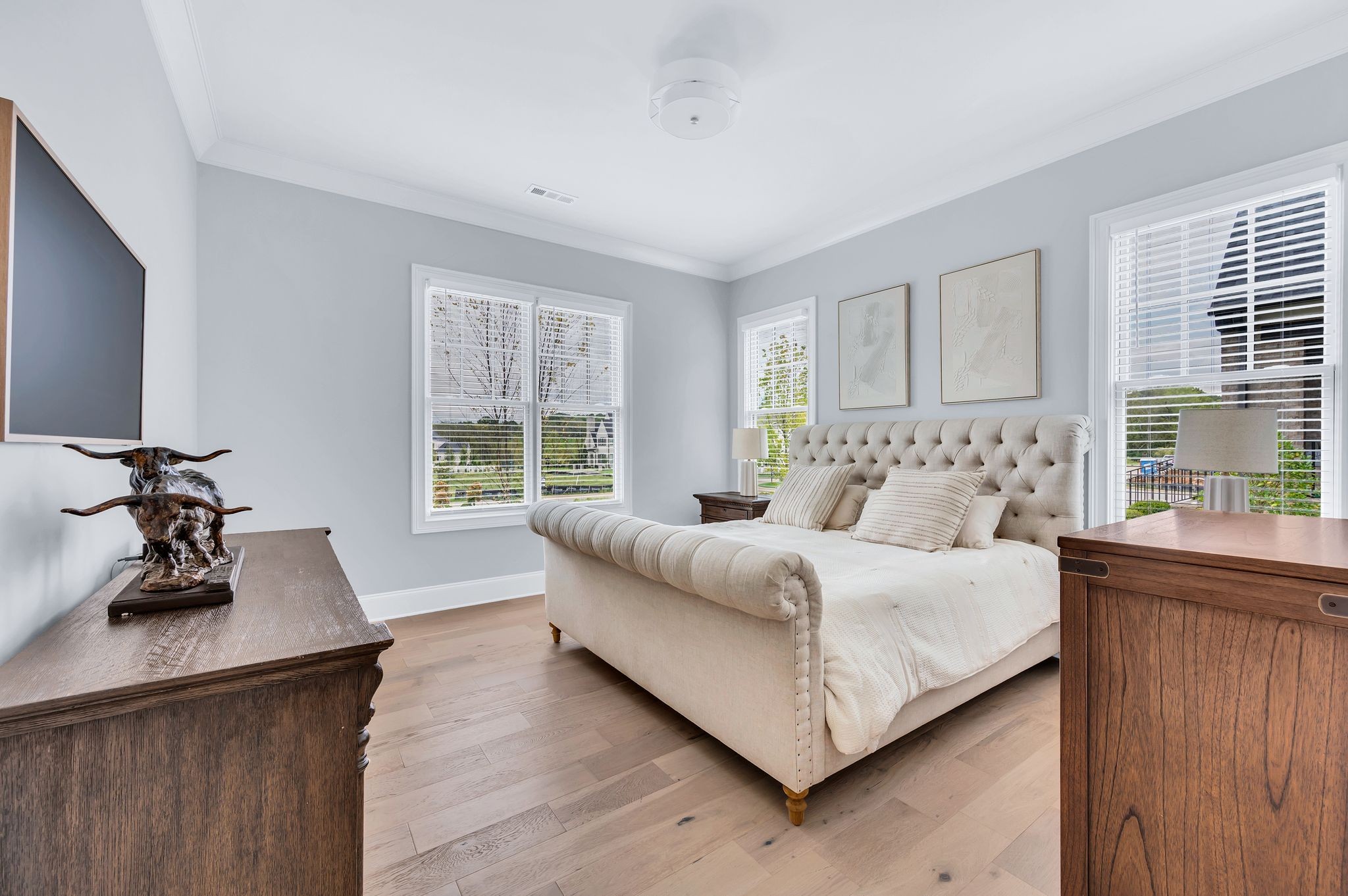 6081 Pasquo Road Nashville, TN 37221 - Photo 46 of 70 a bedroom with a bed and a dresser