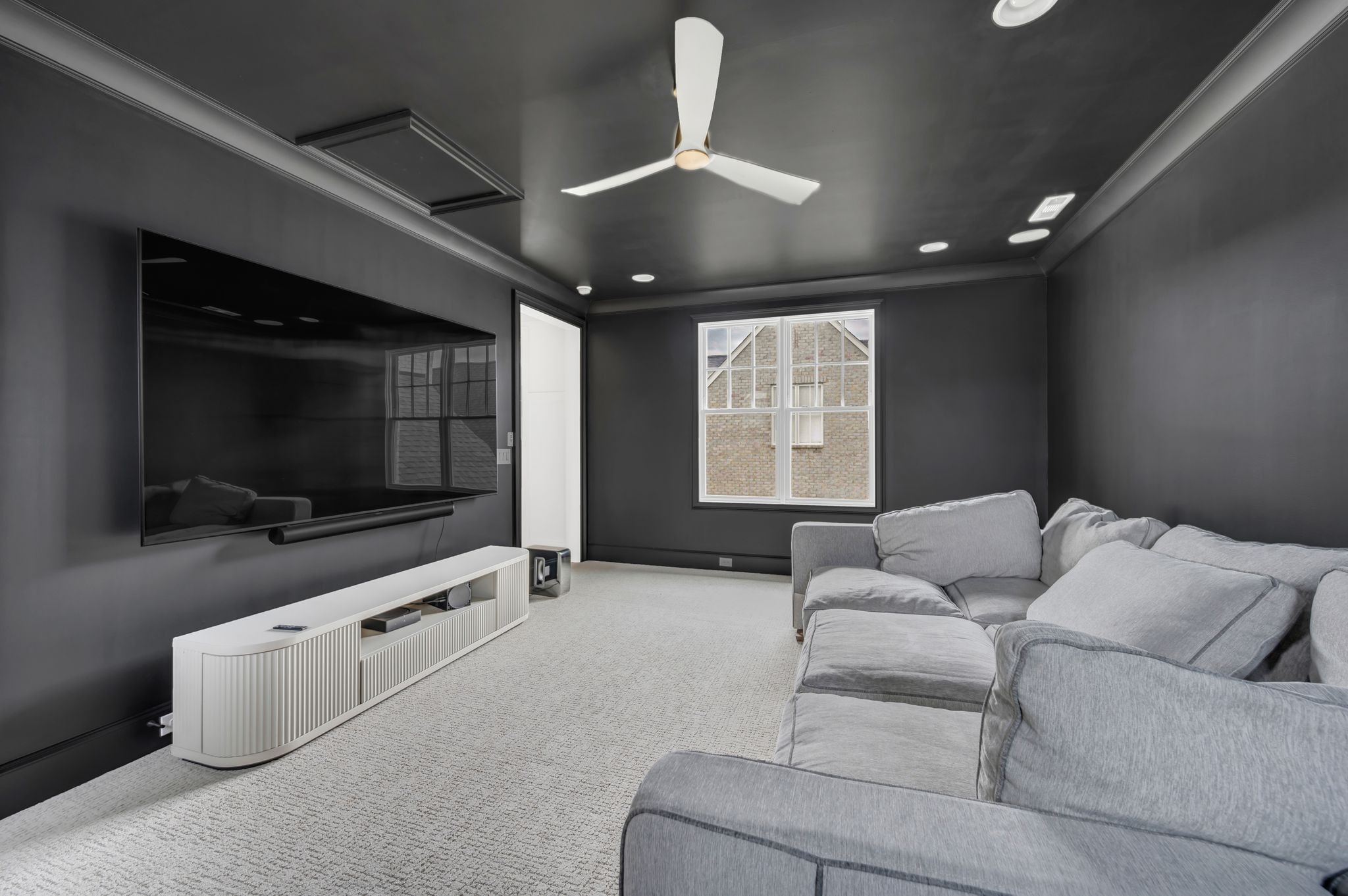6081 Pasquo Road Nashville, TN 37221 - Photo 54 of 70 a living room with furniture and a flat screen tv