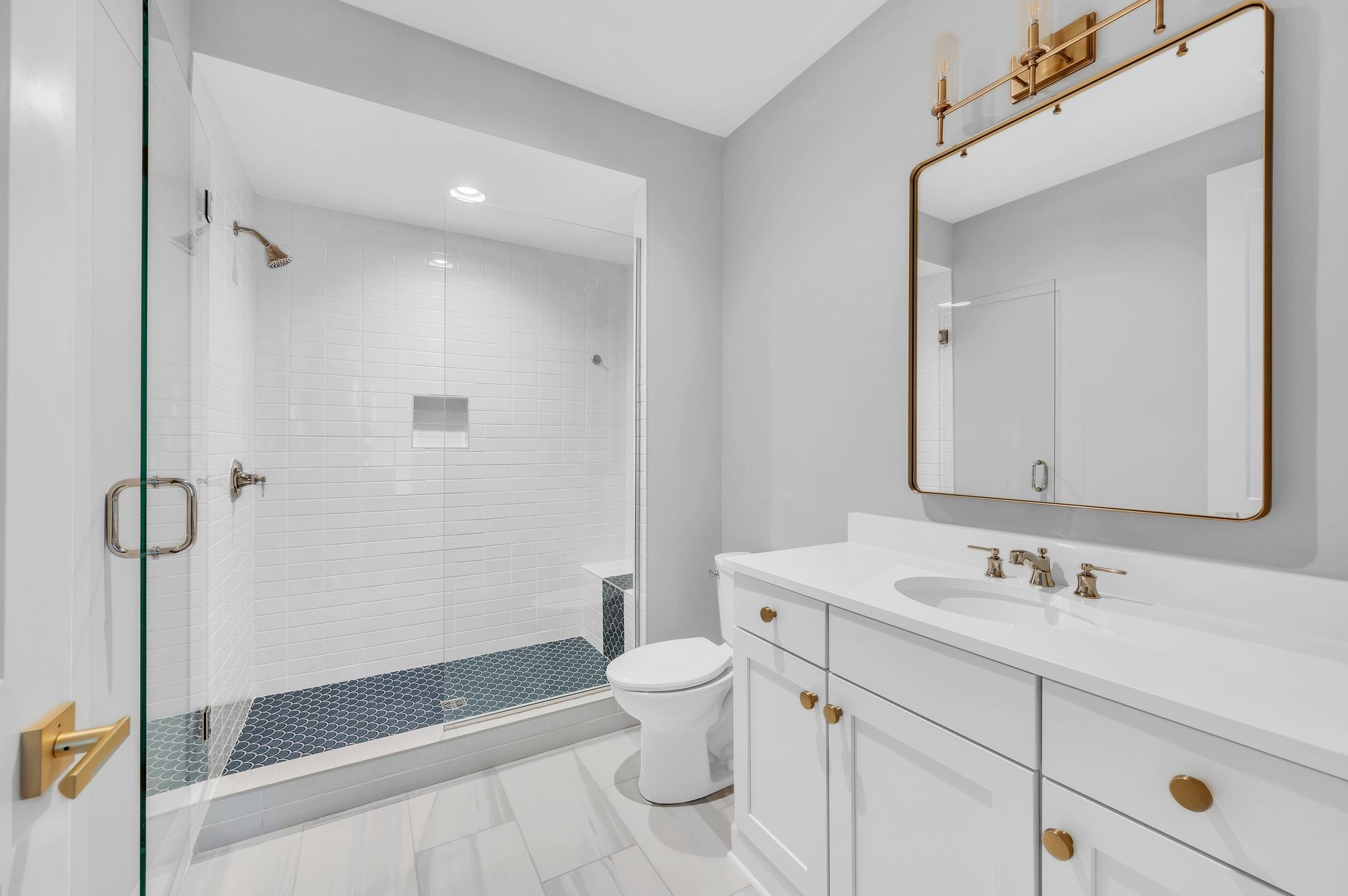6081 Pasquo Road Nashville, TN 37221 - Photo 57 of 70 a bathroom with a sink a toilet and shower