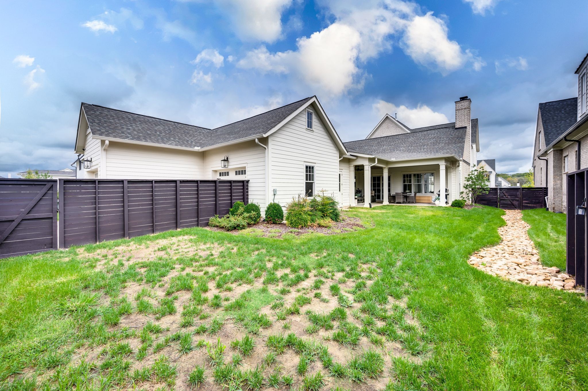 6081 Pasquo Road Nashville, TN 37221 - Photo 70 of 70 a front view of a house with a yard
