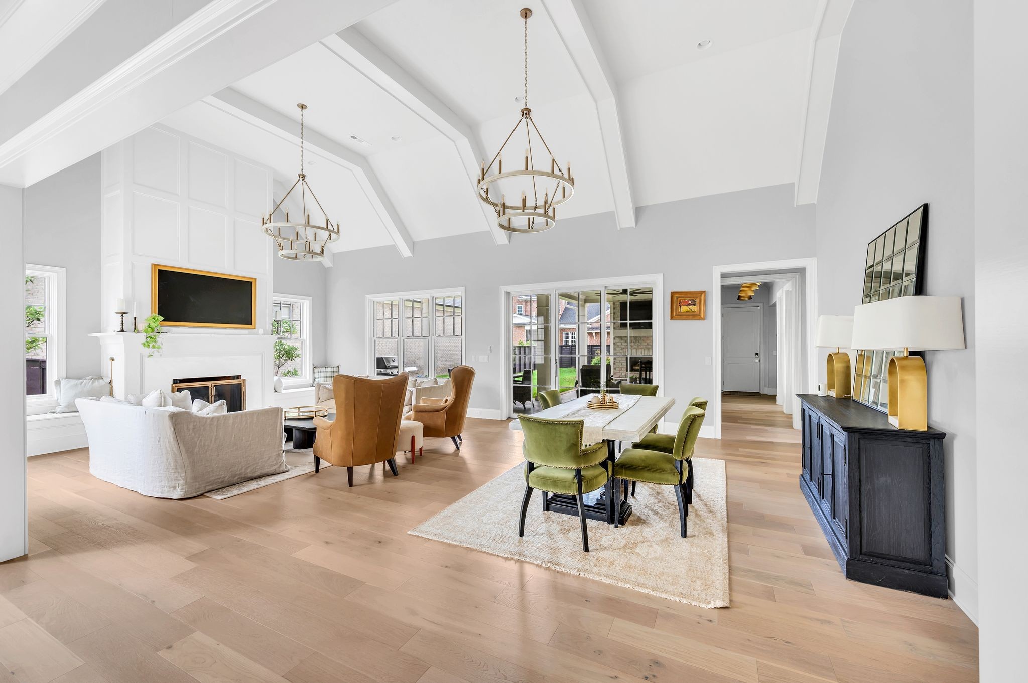 6081 Pasquo Road Nashville, TN 37221 - Photo 10 of 70 a view of a dining room with furniture a rug and wooden floor