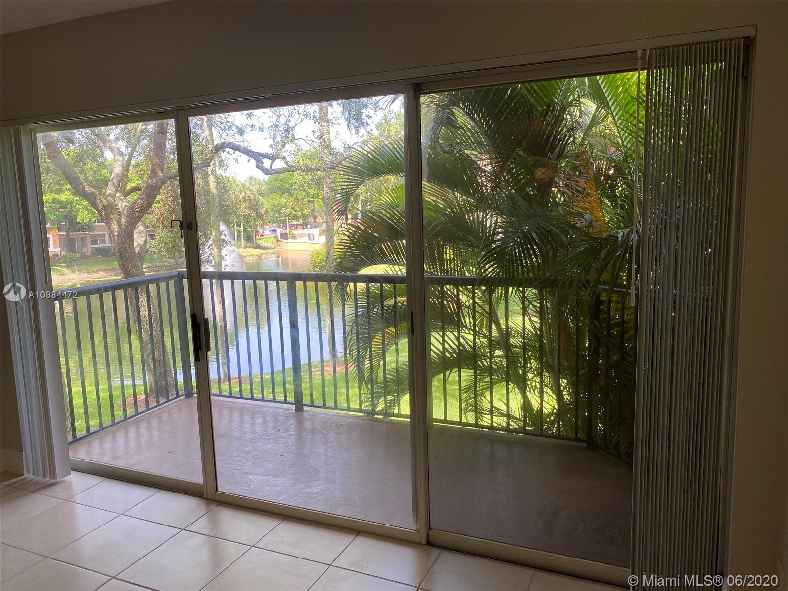 8741 Wiles Road, Unit 204 Coral Springs, FL 33067 - Photo 13 of 22 a view of outdoor from window