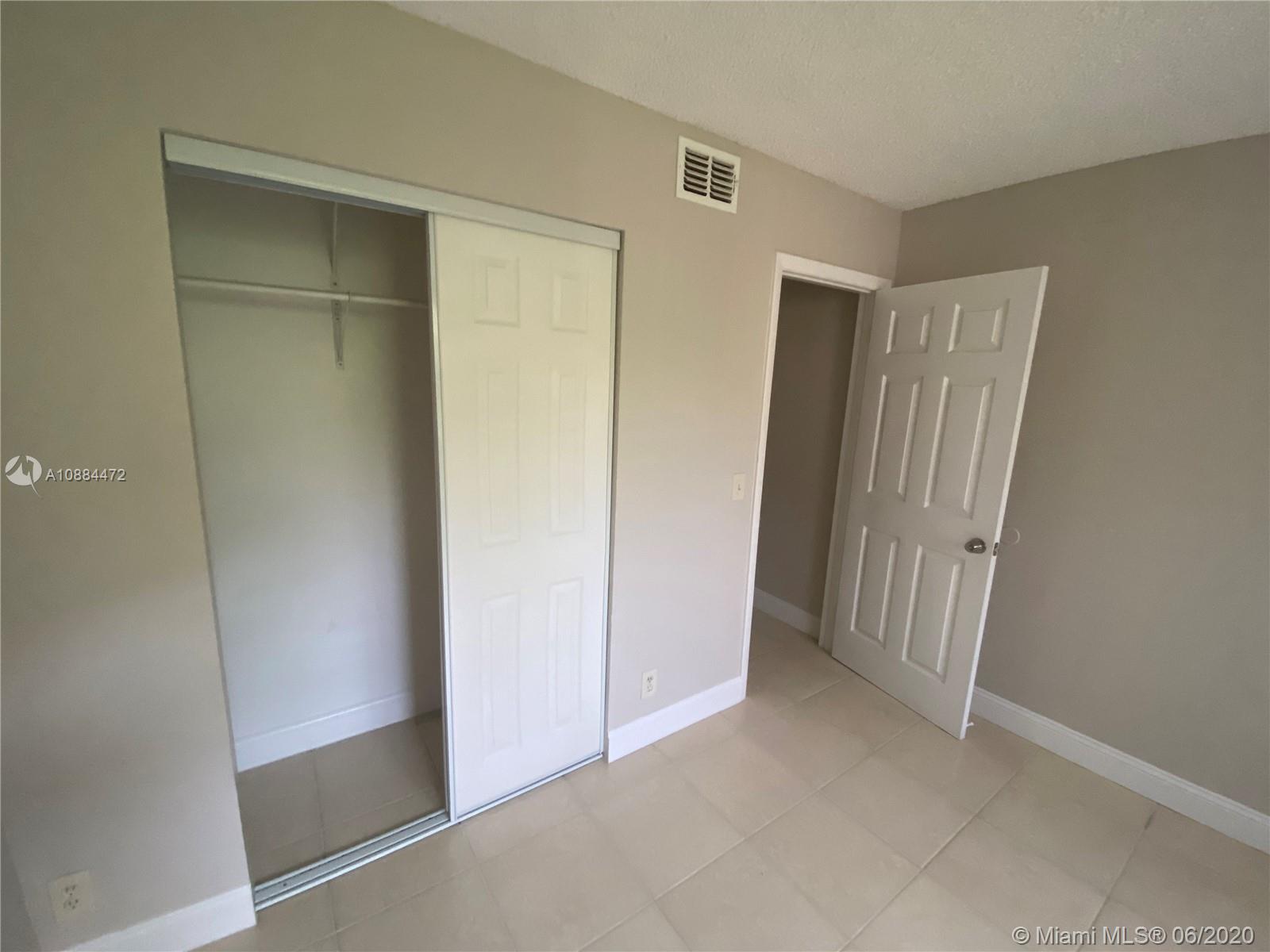 8741 Wiles Road, Unit 204 Coral Springs, FL 33067 - Photo 10 of 22 a view of an empty room