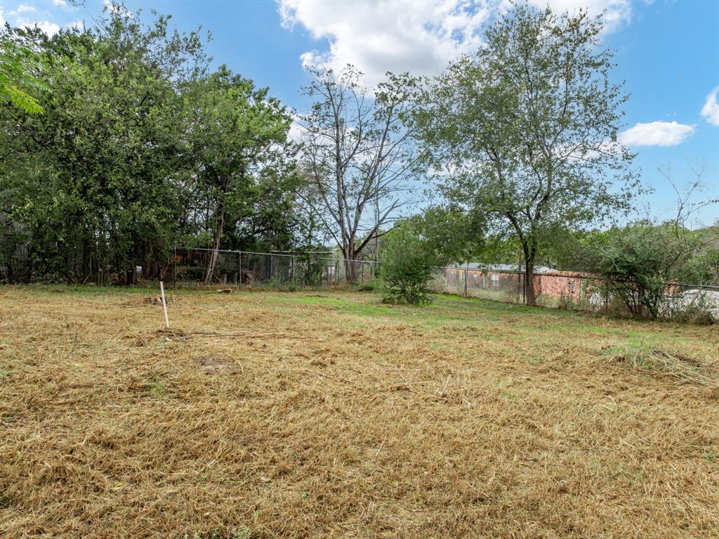 116 Fox Run Whitney, TX 76692 - Photo 23 of 34 a backyard of a house with lots of green space