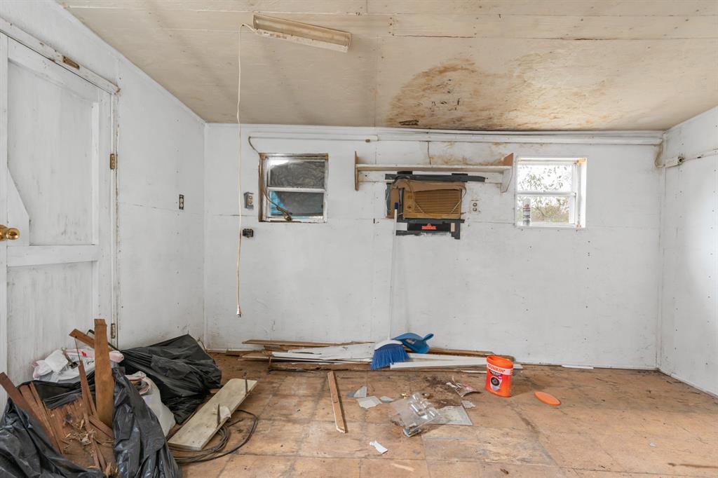 116 Fox Run Whitney, TX 76692 - Photo 30 of 34 a bed room with a bed and a couch