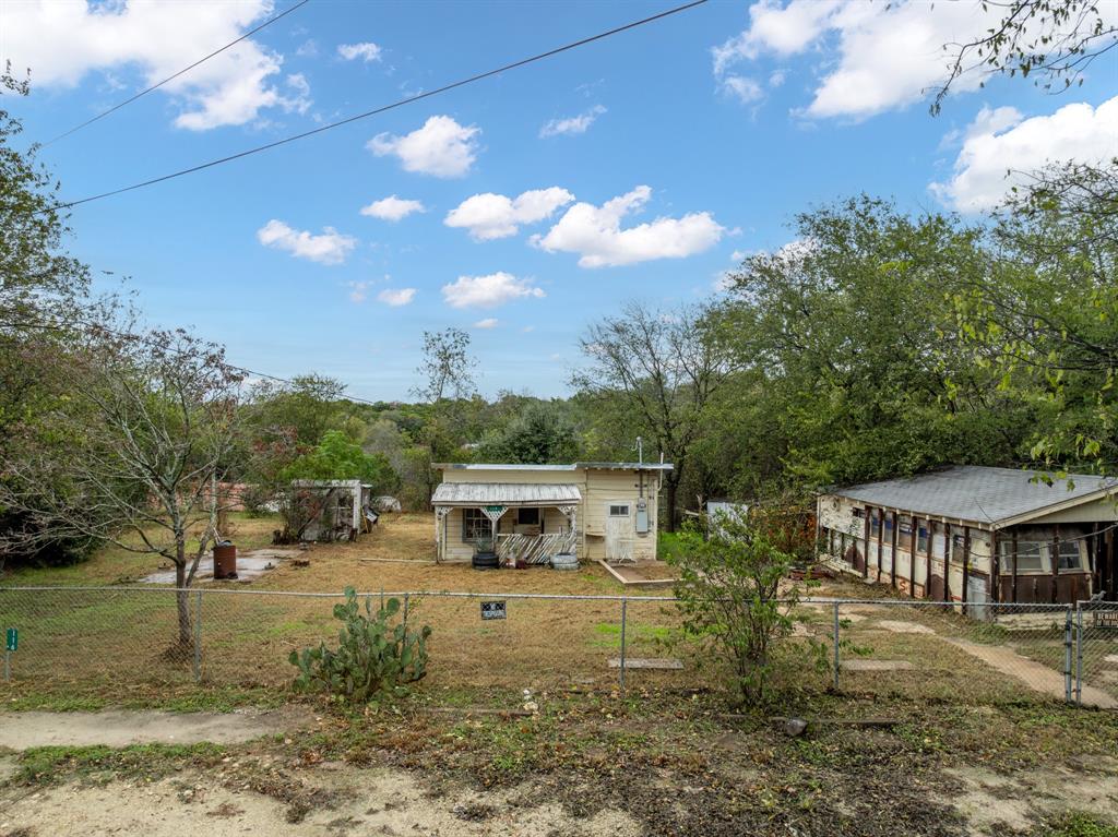 116 Fox Run Whitney, TX 76692 - Photo 8 of 34 a view of a house with a yard