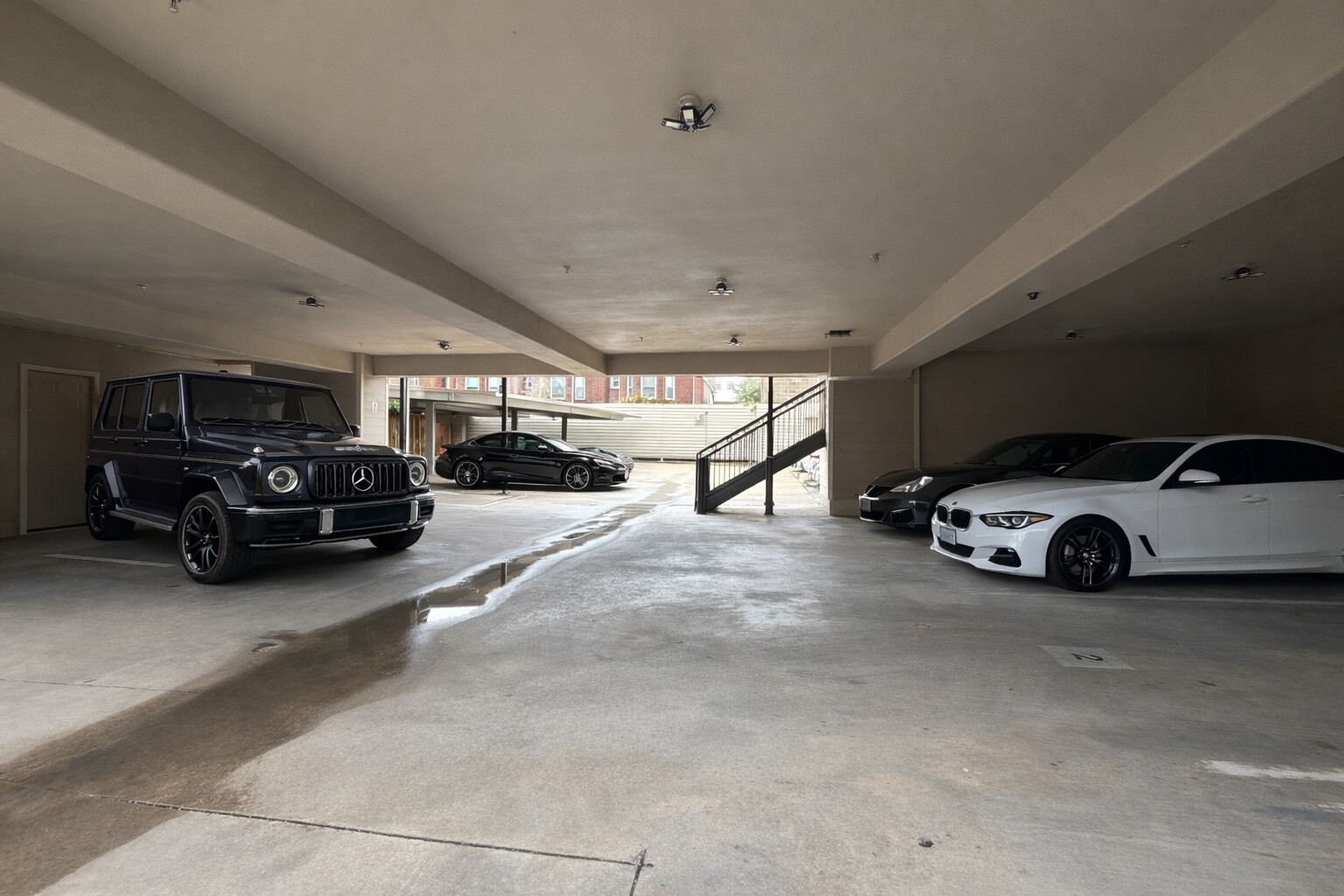 2216 Chenevert Street, Unit 6 Houston, TX 77003 - Photo 26 of 29 a view of parking garage with cars parked