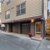 a kitchen with a stove a sink and a microwave