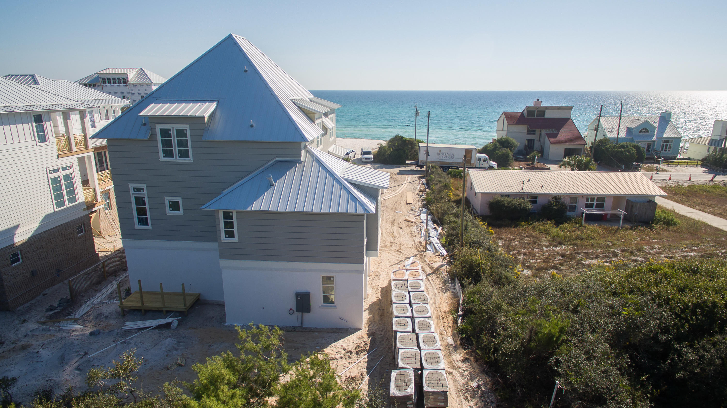 Lot 136 Pompano St Inlet Beach Inlet Beach, FL 32461 - Photo 9 of 21 a aerial view of a house with a yard
