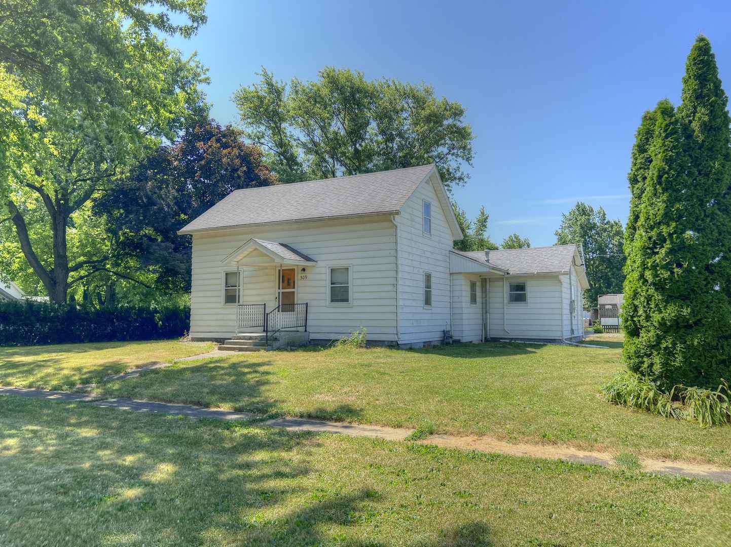 309 Jefferson Street Danforth, IL 60930 - Photo 1 of 45 a view of a house with a yard and swimming pool