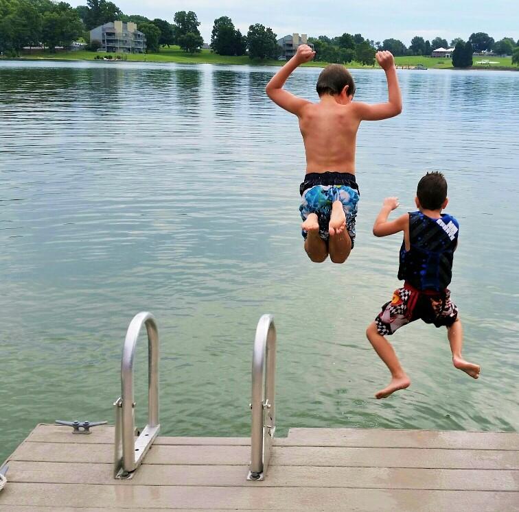 185 Tranquility Road Moneta, VA 24121 - Photo 35 of 42 boys_jumping_off_dock (2)