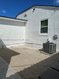 1084 Northwest 64th Street Miami, FL 33150 - Photo 12 of 12 a bathroom with a sink and a mirror