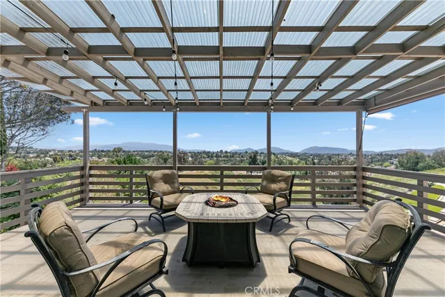 a large kitchen with a table and chairs