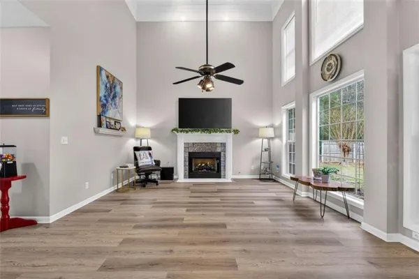 a view of an entryway with wooden floor and door