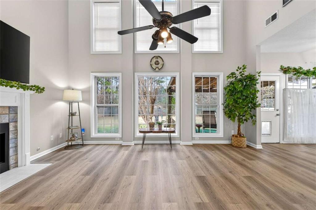 230 Gaelic Way Tyrone, GA 30290 - Photo 22 of 53 a view of an entryway with wooden floor and door