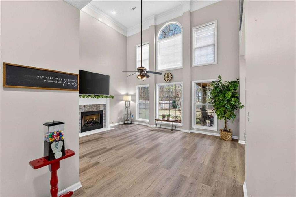 230 Gaelic Way Tyrone, GA 30290 - Photo 24 of 53 a view of an empty room with a fireplace and a window