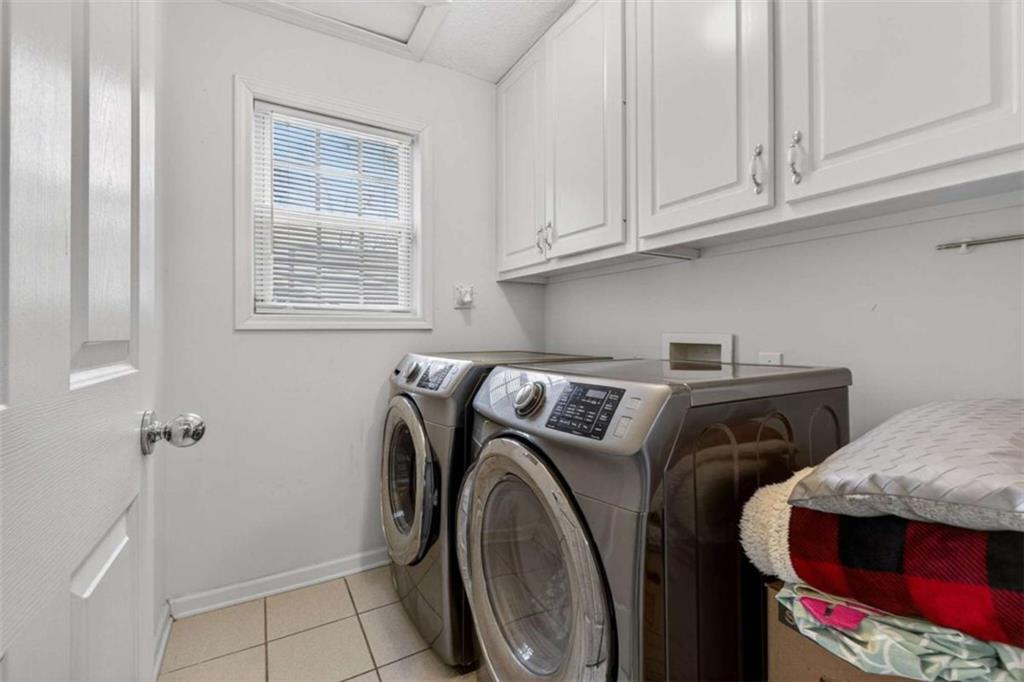 230 Gaelic Way Tyrone, GA 30290 - Photo 27 of 53 a utility room with dryer and washer