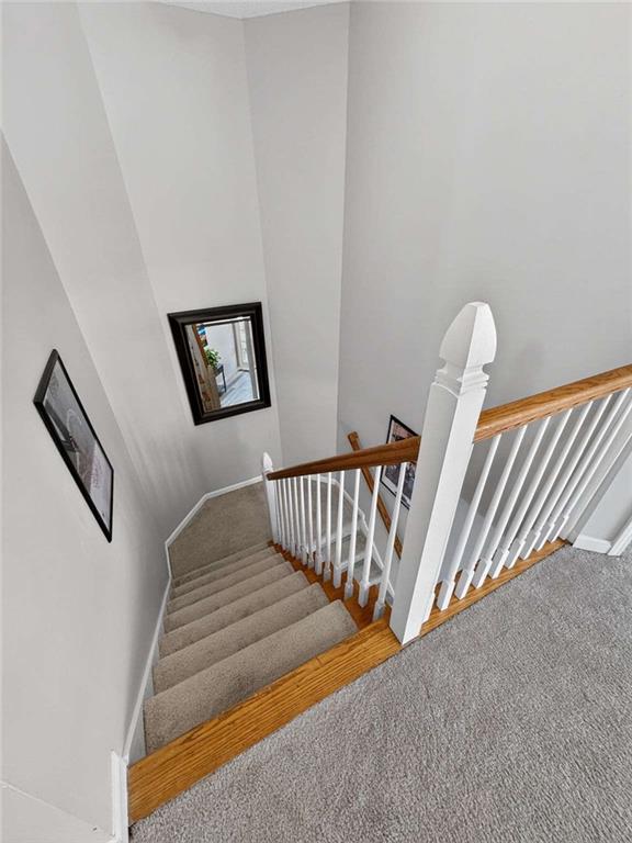 230 Gaelic Way Tyrone, GA 30290 - Photo 28 of 53 a view of staircase with white walls