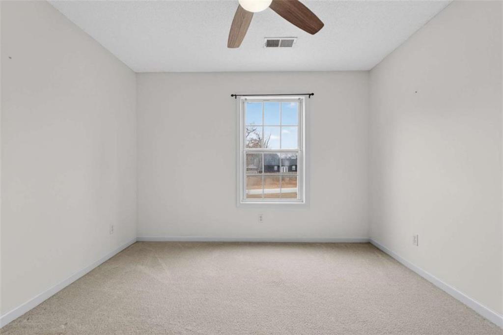 230 Gaelic Way Tyrone, GA 30290 - Photo 36 of 53 an empty room with a window