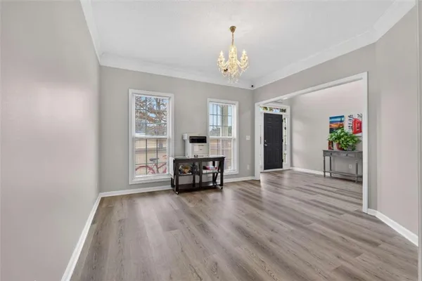 a view of livingroom with furniture and wooden floor