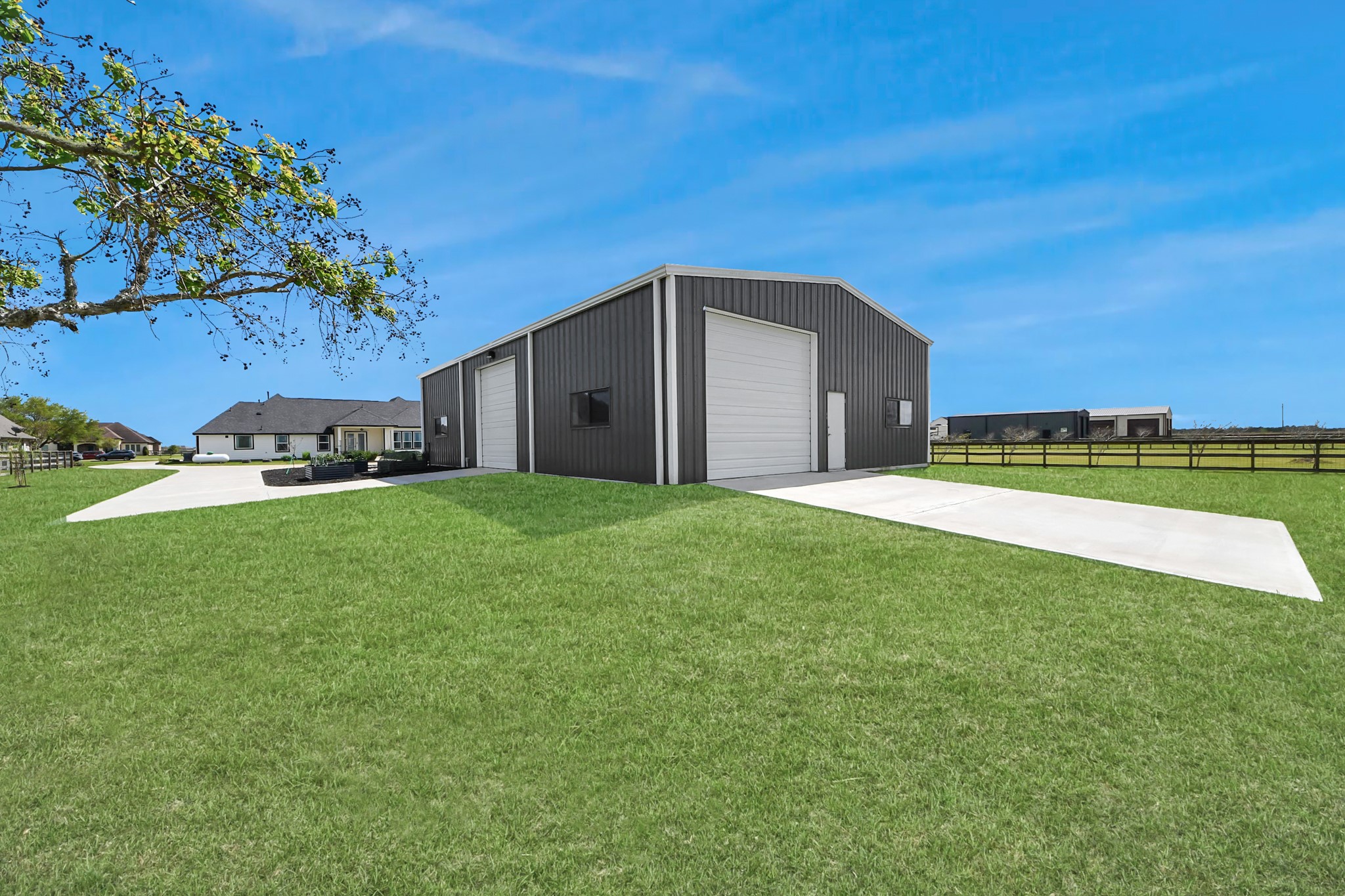 7723 Stratford Hall Drive Rosharon, TX 77583 - Photo 14 of 50 a front view of a house with a yard