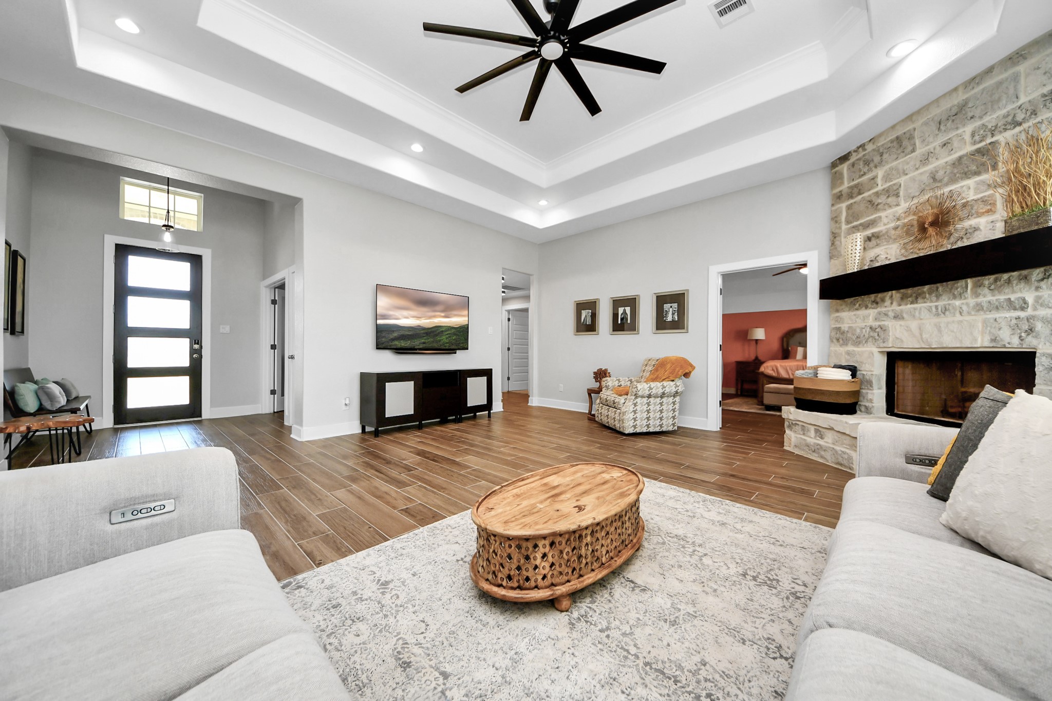 7723 Stratford Hall Drive Rosharon, TX 77583 - Photo 19 of 50 a living room with furniture and a fireplace