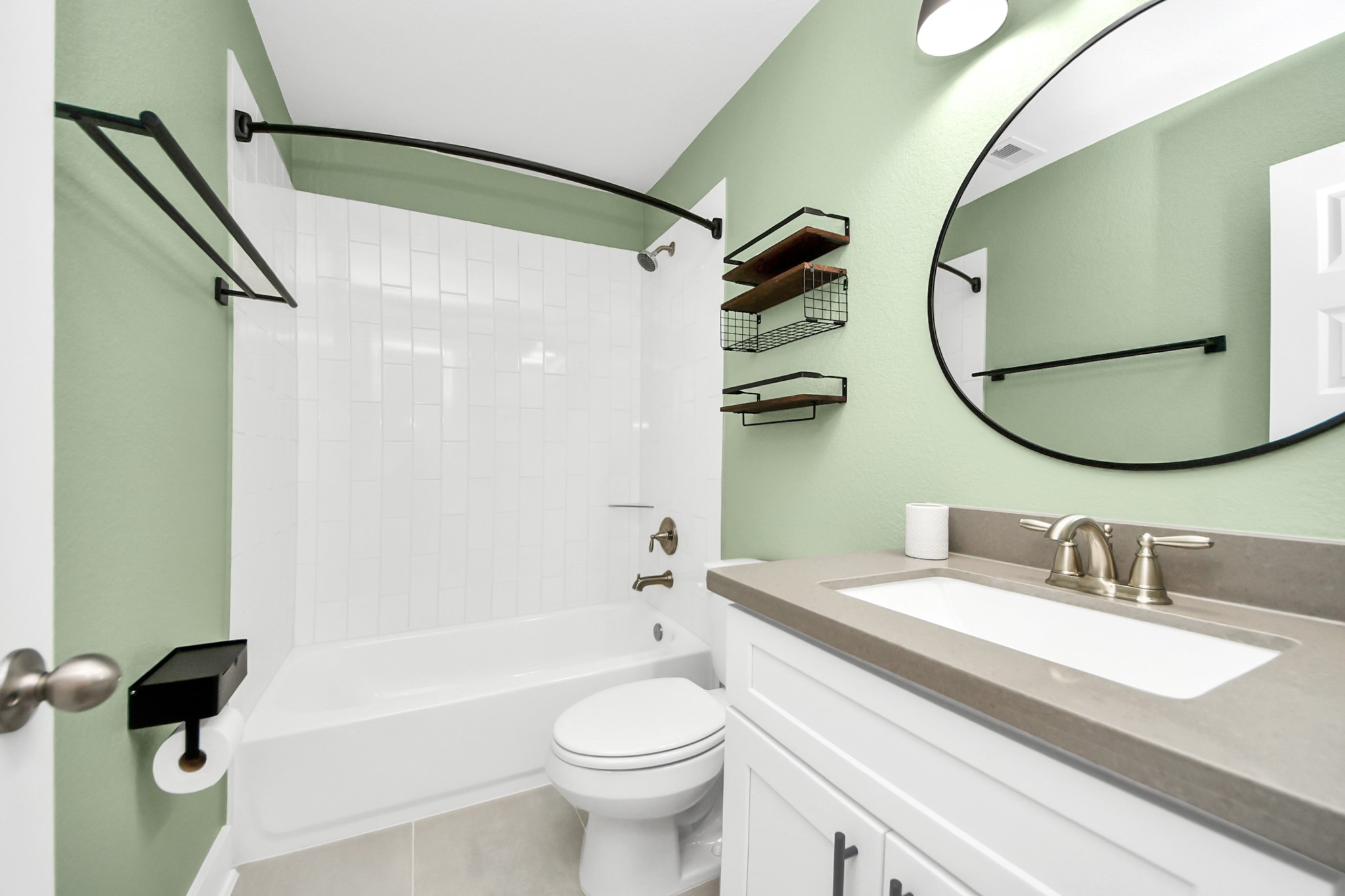 7723 Stratford Hall Drive Rosharon, TX 77583 - Photo 37 of 50 a bathroom with a sink a toilet and a mirror