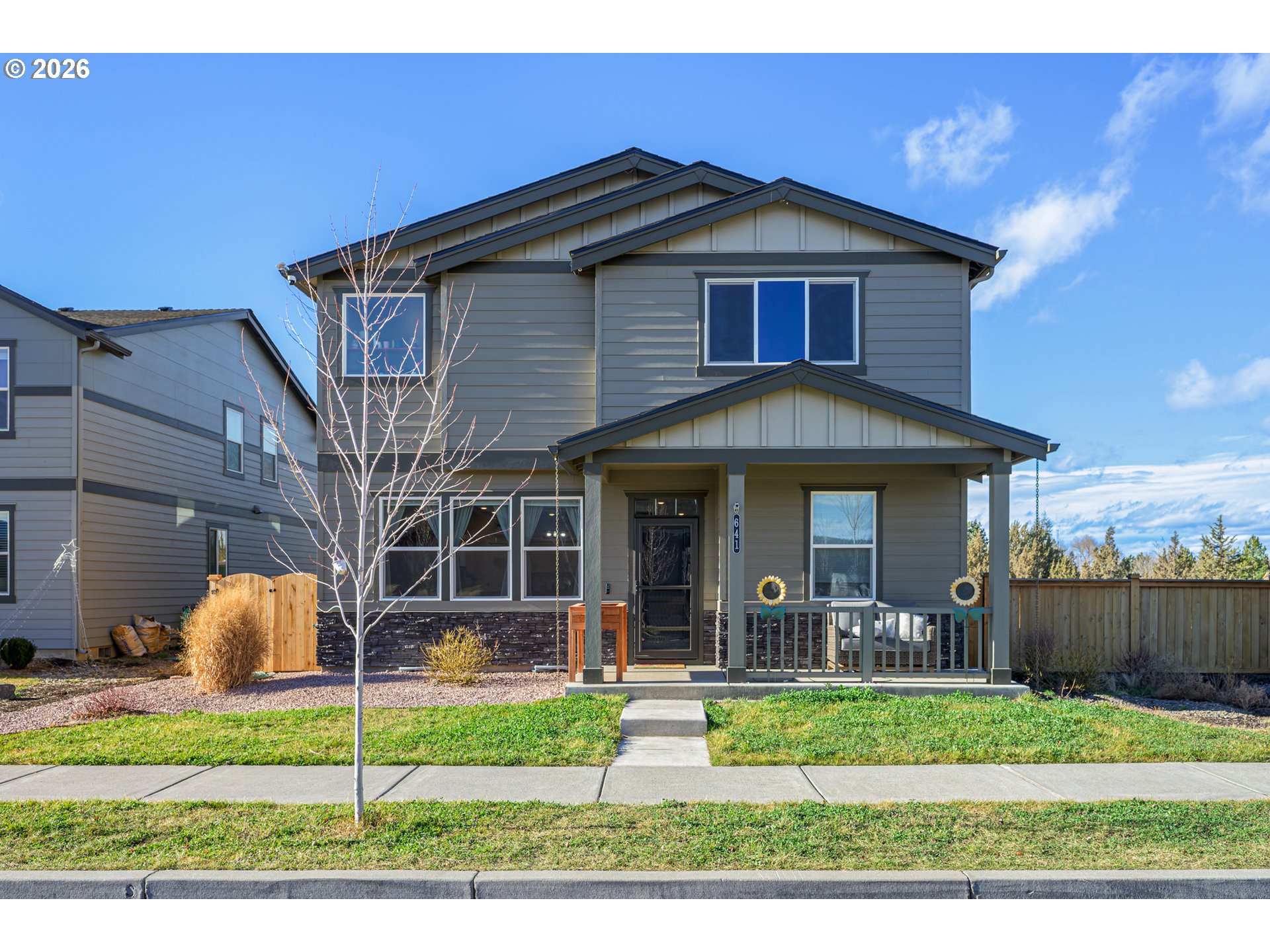641 Northeast Union Loop Prineville, OR 97754 - Photo 1 of 23 a front view of a house with a yard