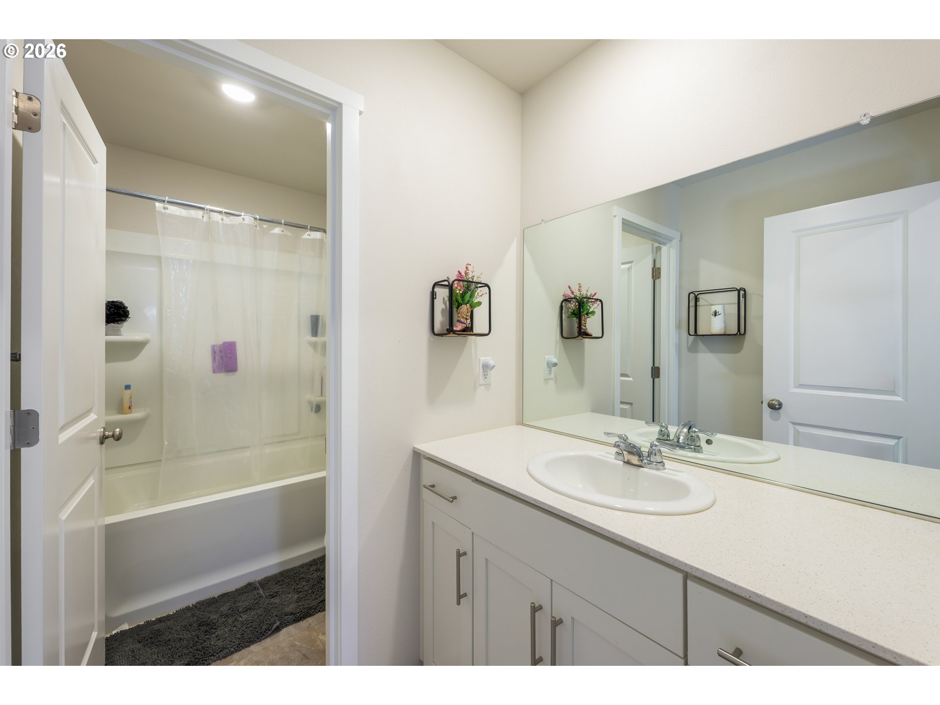 641 Northeast Union Loop Prineville, OR 97754 - Photo 11 of 23 a bathroom with a sink mirror shower and a bathtub