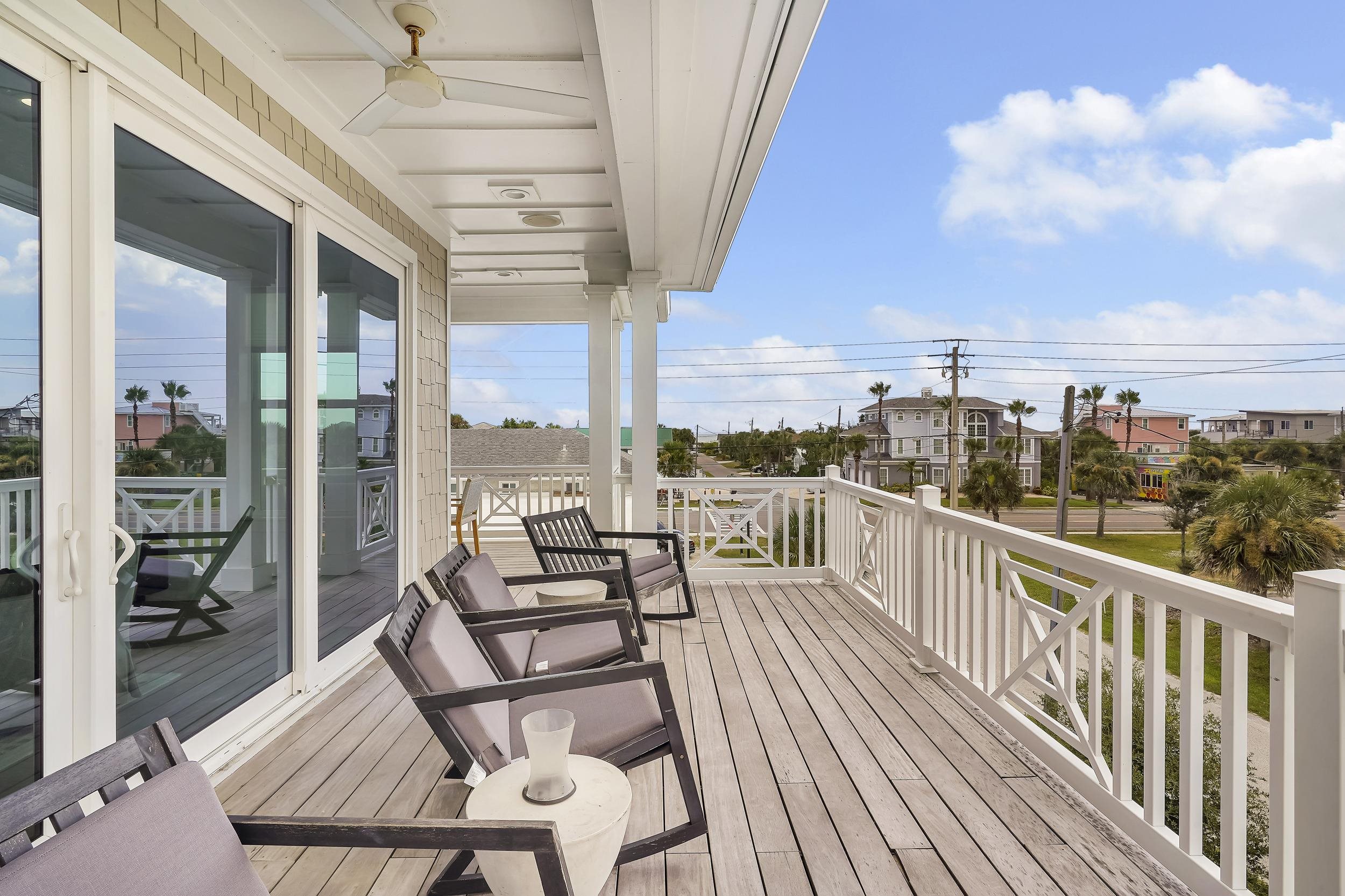 104 7th Street St. Augustine, FL 32080 - Photo 19 of 59 Wooden terrace featuring a residential view and ceiling fan