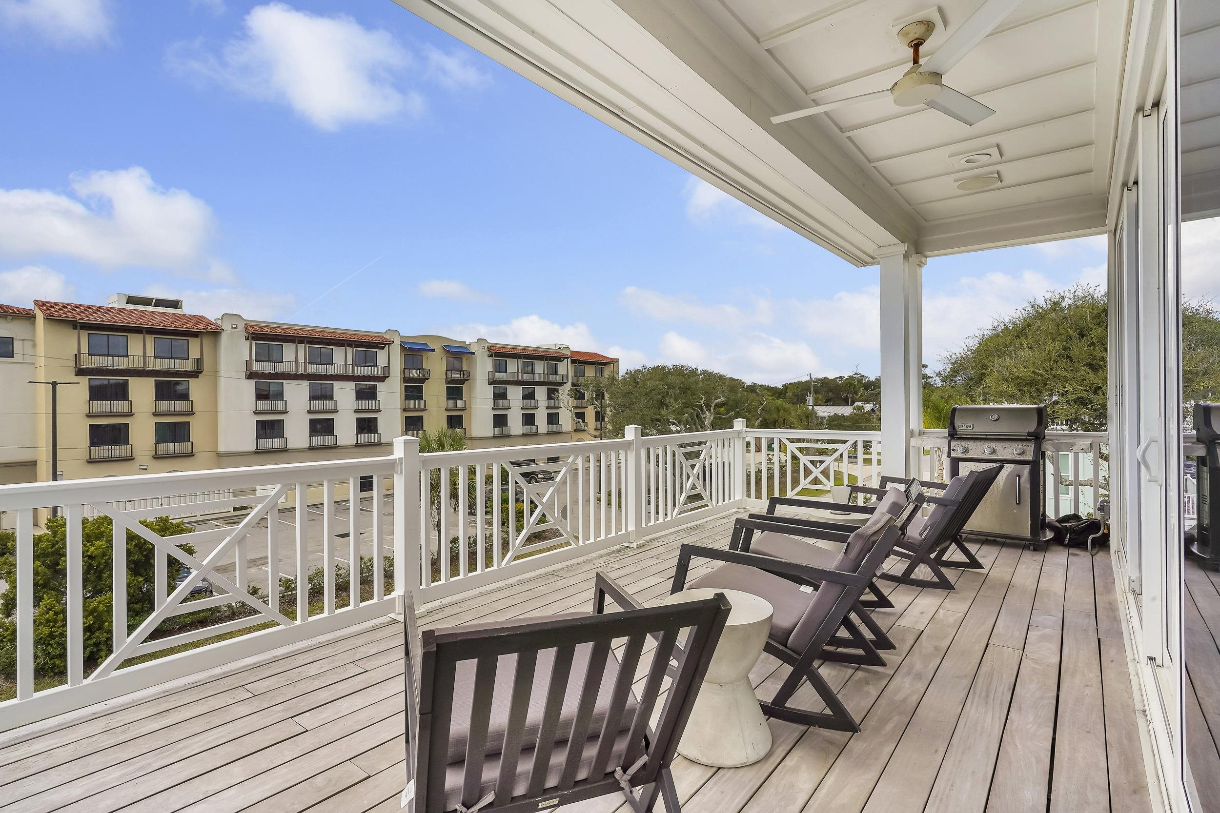 104 7th Street St. Augustine, FL 32080 - Photo 20 of 59 Wooden terrace featuring ceiling fan and area for grilling