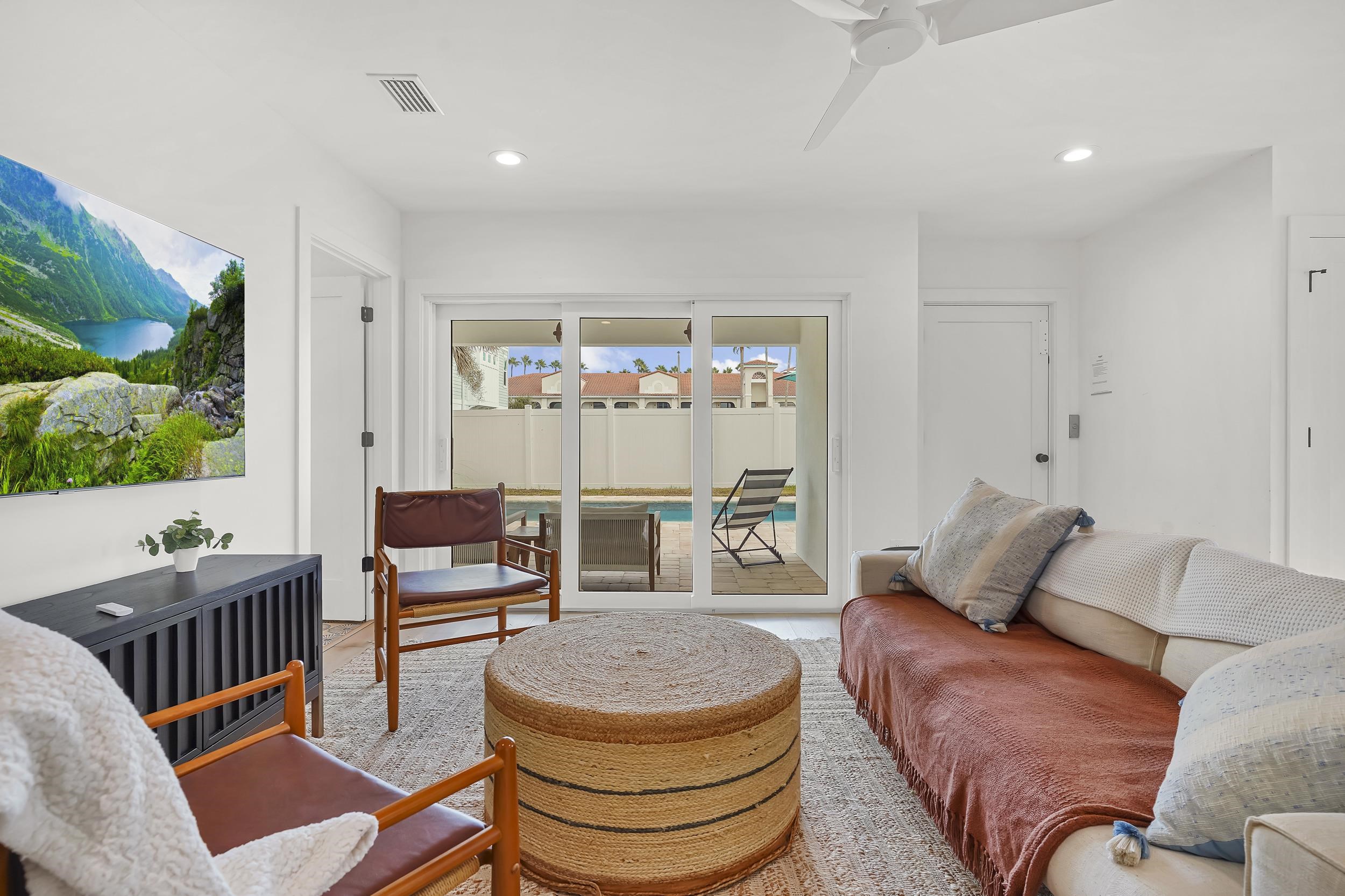 104 7th Street St. Augustine, FL 32080 - Photo 25 of 59 Living room featuring a ceiling fan and recessed lighting