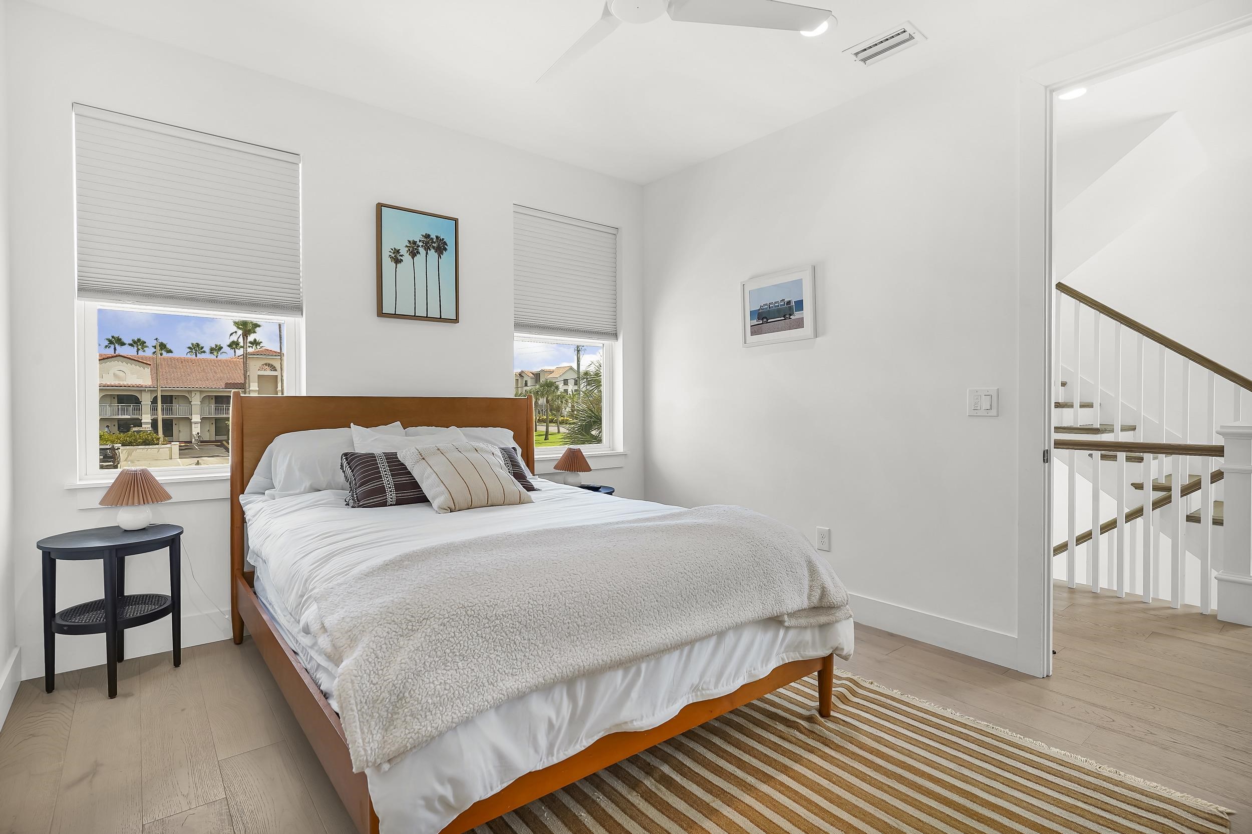 104 7th Street St. Augustine, FL 32080 - Photo 31 of 59 Bedroom featuring light wood-style flooring and a ceiling fan