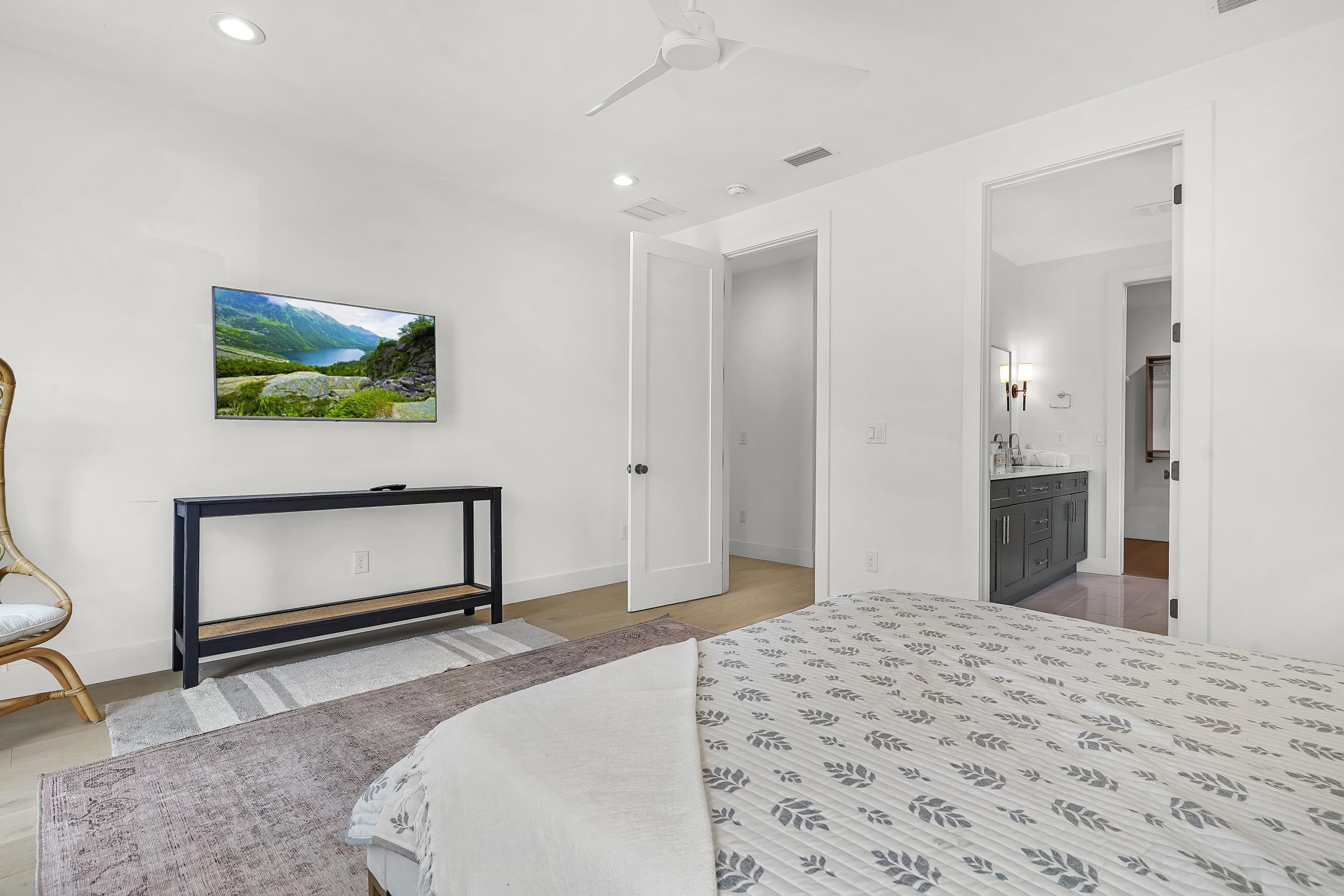 104 7th Street St. Augustine, FL 32080 - Photo 39 of 59 Bedroom with a ceiling fan, recessed lighting, and ensuite bathroom