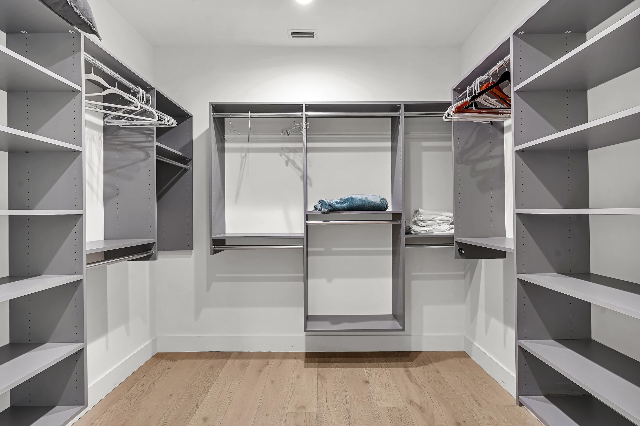 104 7th Street St. Augustine, FL 32080 - Photo 41 of 59 Walk in closet with light wood finished floors