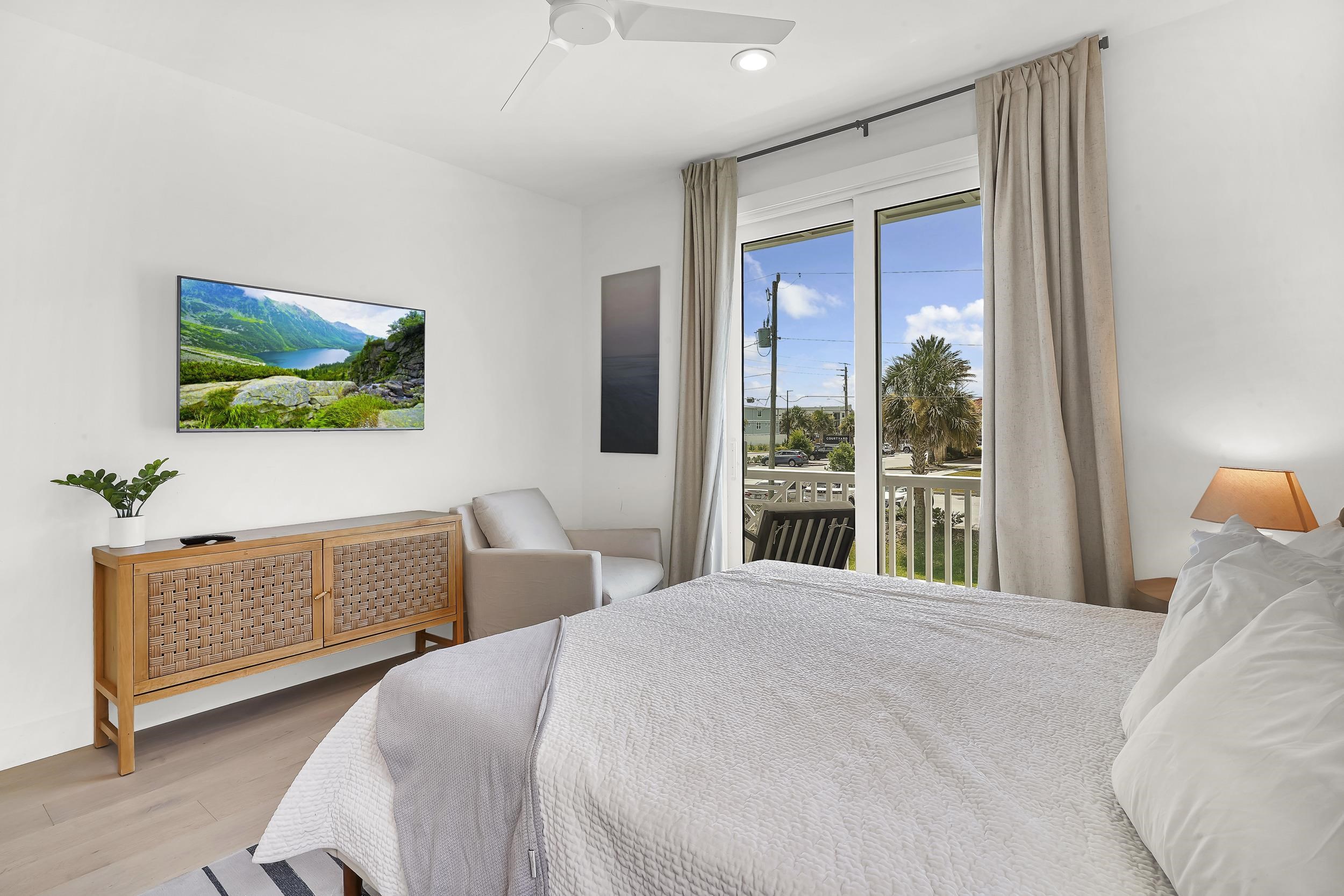 104 7th Street St. Augustine, FL 32080 - Photo 45 of 59 Bedroom featuring access to exterior, wood finished floors, a ceiling fan, and recessed lighting