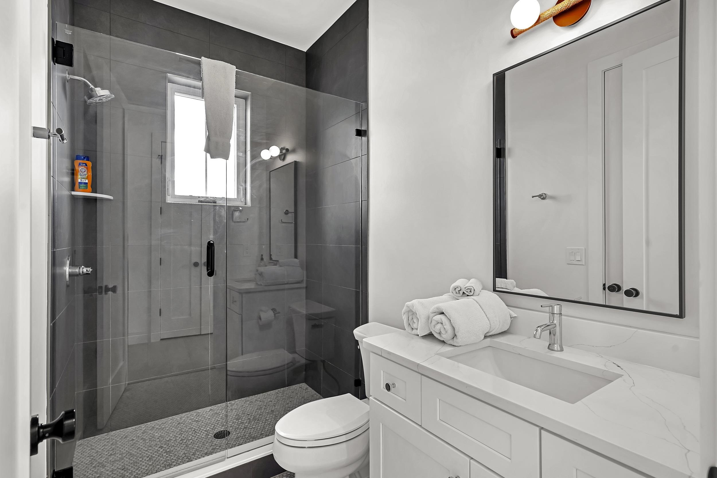 104 7th Street St. Augustine, FL 32080 - Photo 50 of 59 Full bathroom featuring vanity and a shower stall