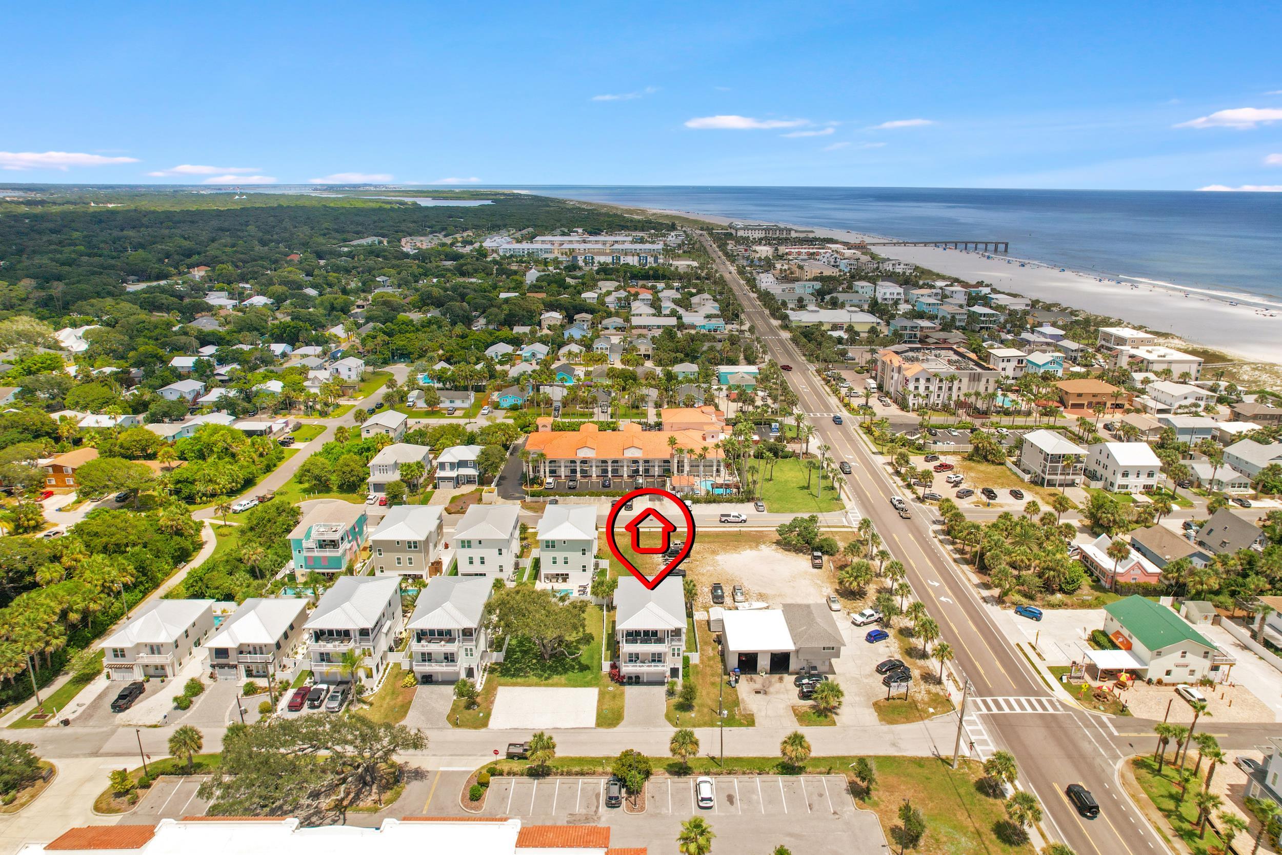 104 7th Street St. Augustine, FL 32080 - Photo 56 of 59 Aerial view of property and surrounding area featuring extended coastline and nearby suburban area
