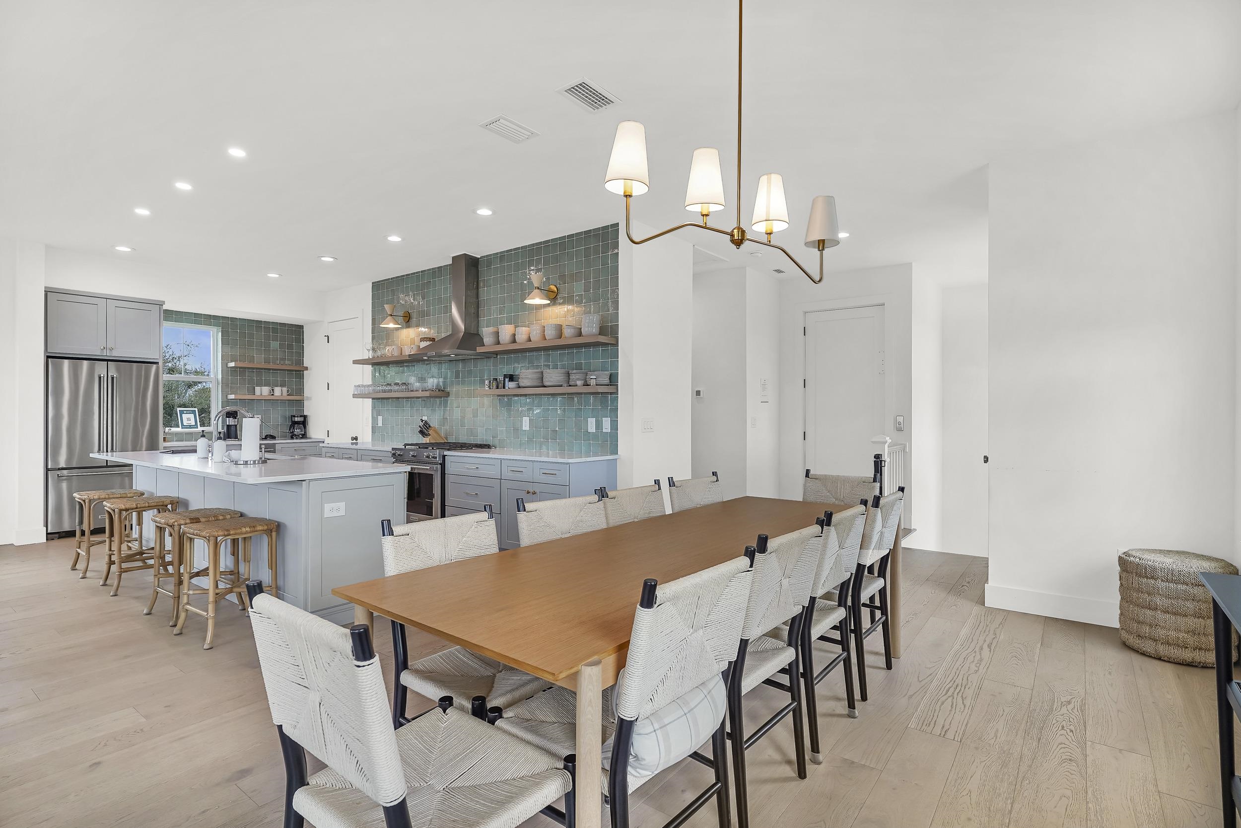 104 7th Street St. Augustine, FL 32080 - Photo 9 of 59 Dining area featuring light wood-style flooring and suspended lighting