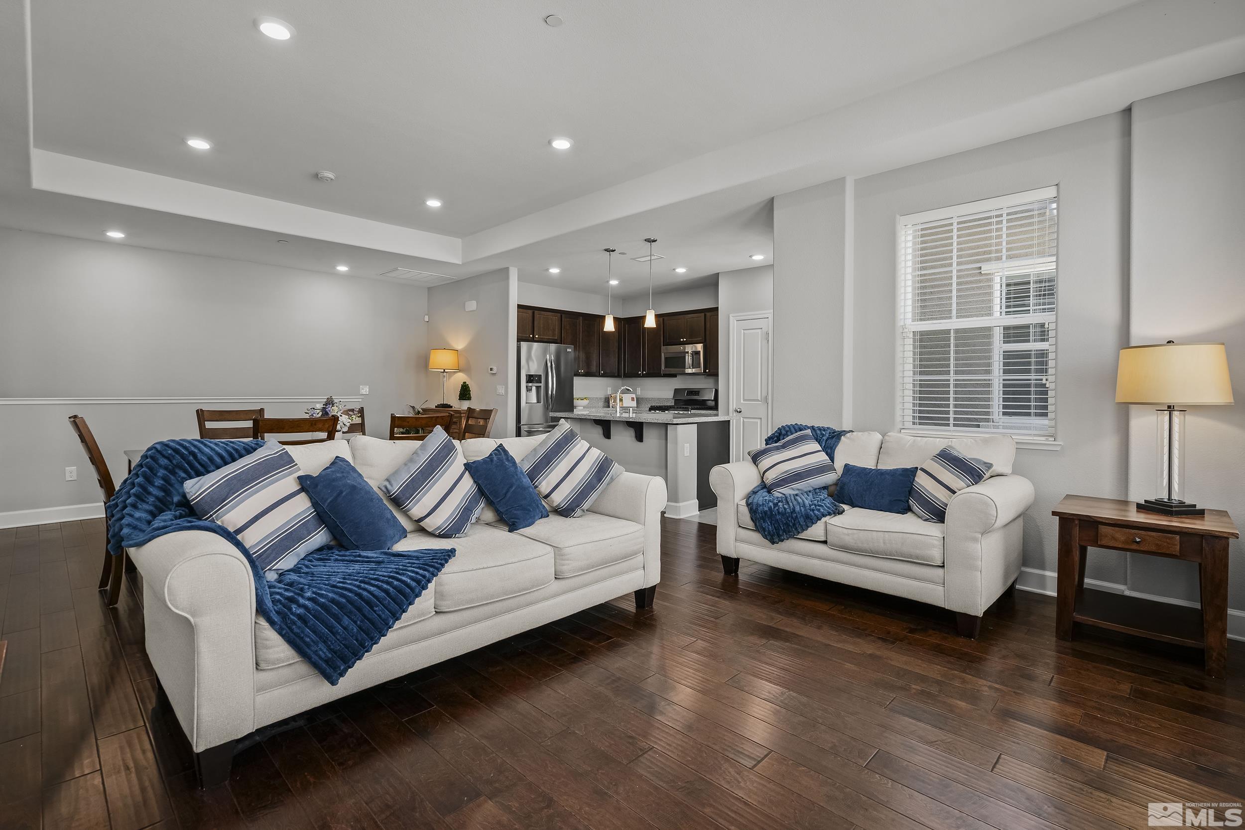 2037 Wind Ranch Road, Unit A Reno, NV 89521 - Photo 14 of 39 a living room with furniture and a couch