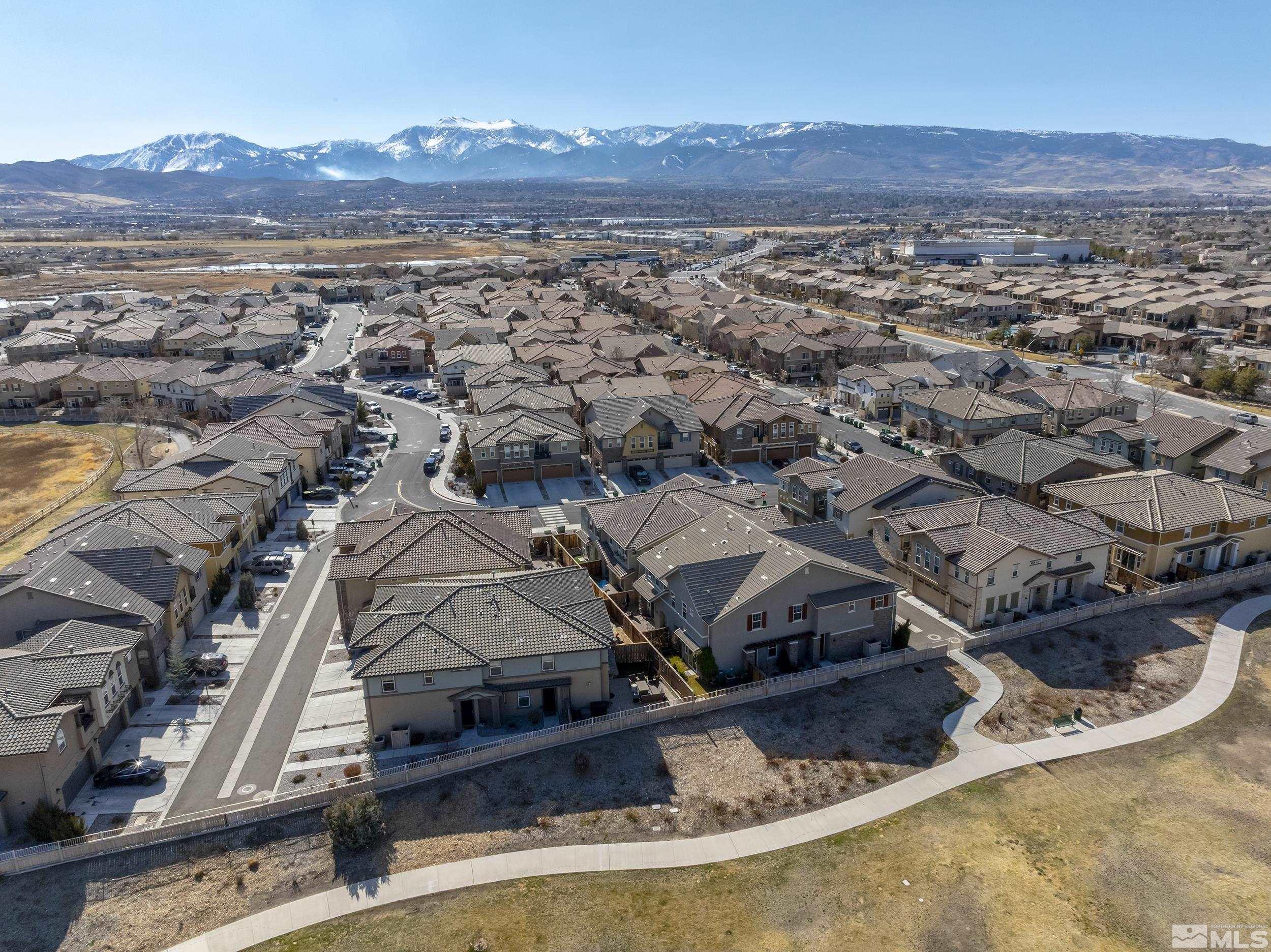 2037 Wind Ranch Road, Unit A Reno, NV 89521 - Photo 31 of 39 an aerial view of residential houses with outdoor space
