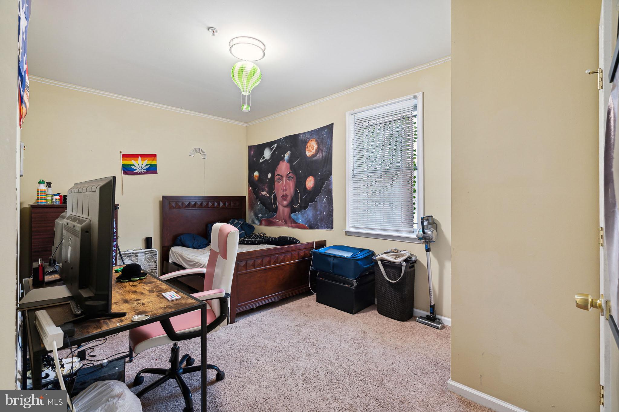 1611 North 17th Street, Unit 2 Philadelphia, PA 19121 - Photo 8 of 18 a work room with furniture and a window