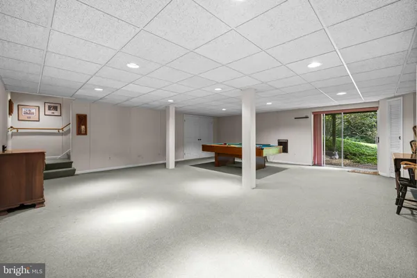 a view of balcony with wooden floor