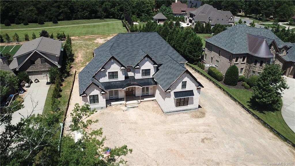 2012 Connonade Drive Waxhaw, NC 28173 - Photo 2 of 10 an aerial view of a house with a yard and potted plants
